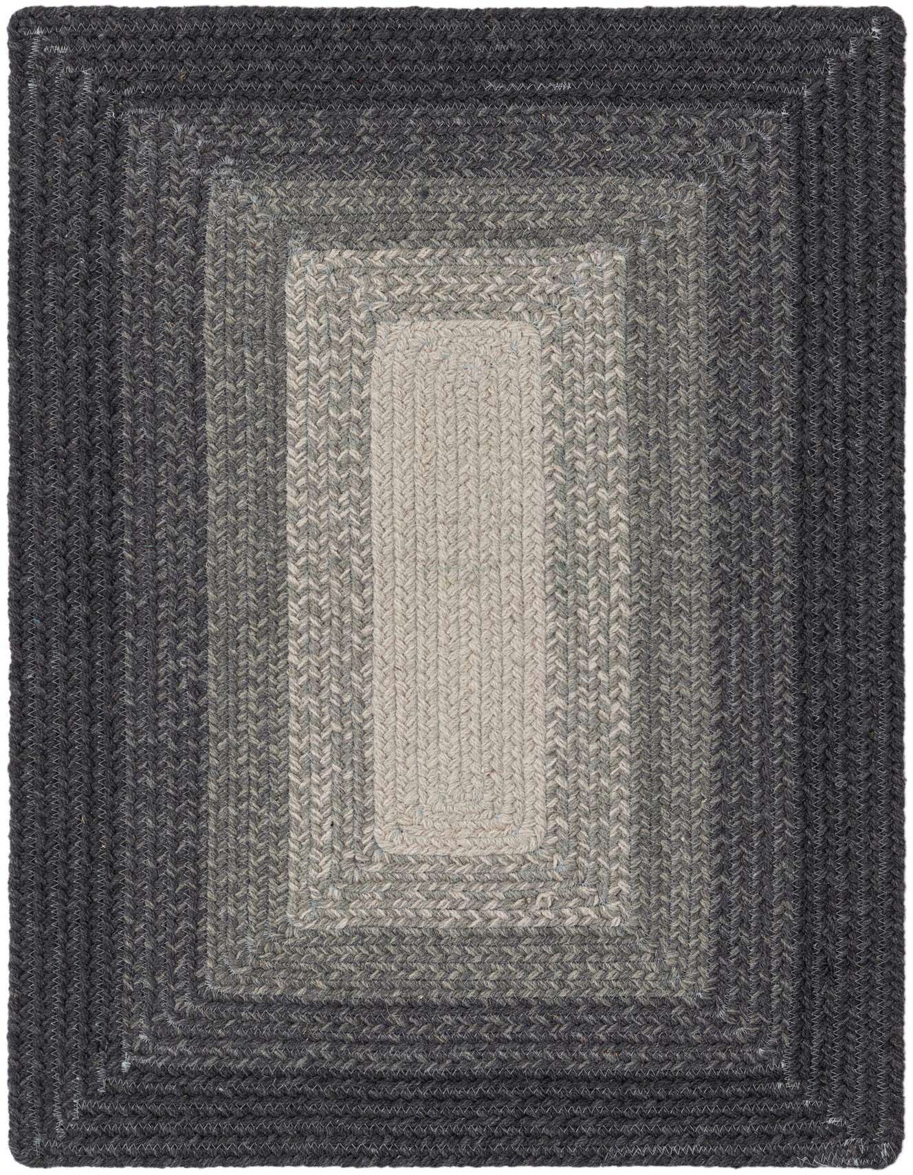 A 2x3 rectangular hand-braided wool rug featuring a modern stripe pattern in varying shades of gray, from dark charcoal to light silver.