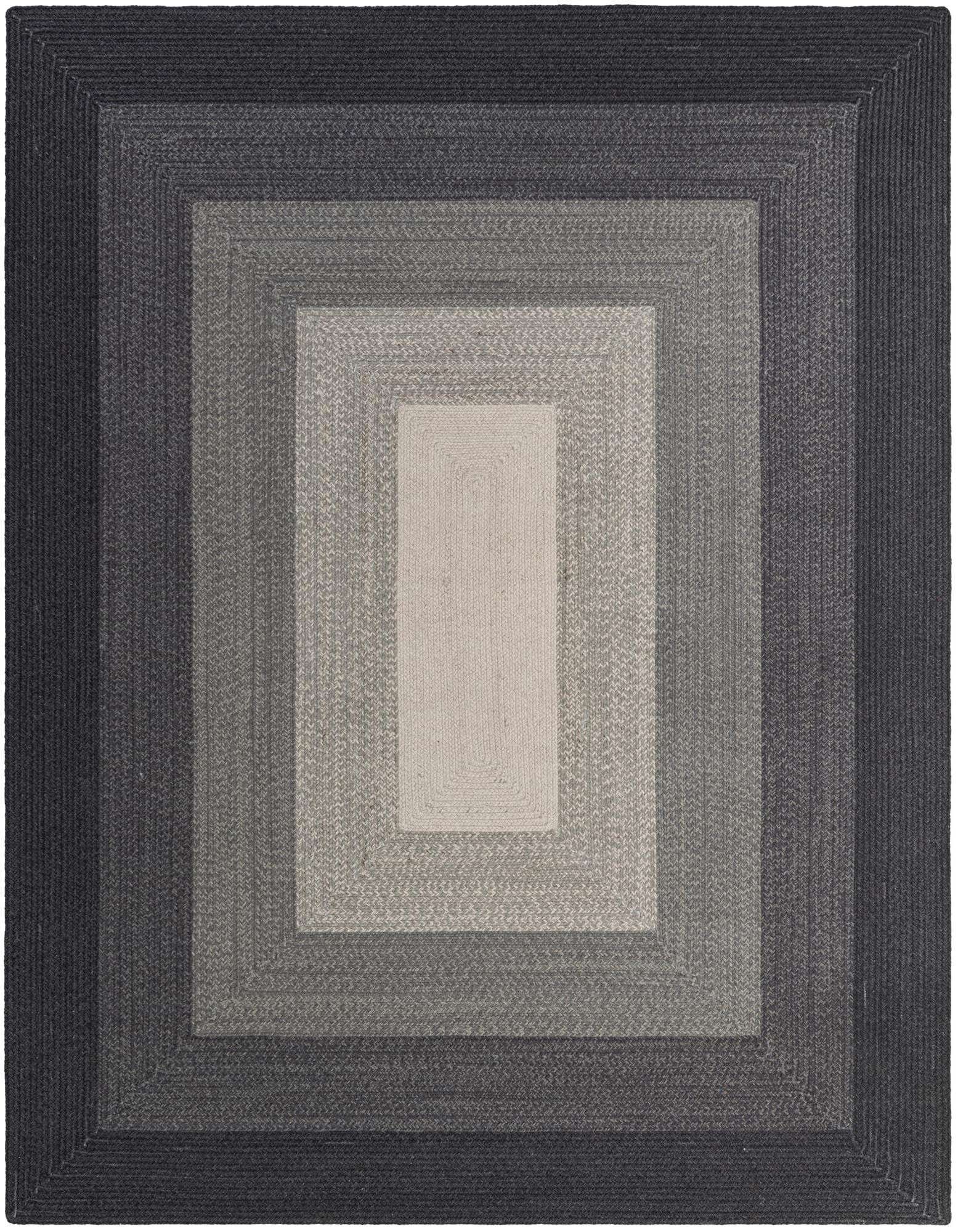 A rectangular 8x10 hand-braided wool rug featuring a gradient of grays, from dark charcoal to light silver, in a nested border pattern.