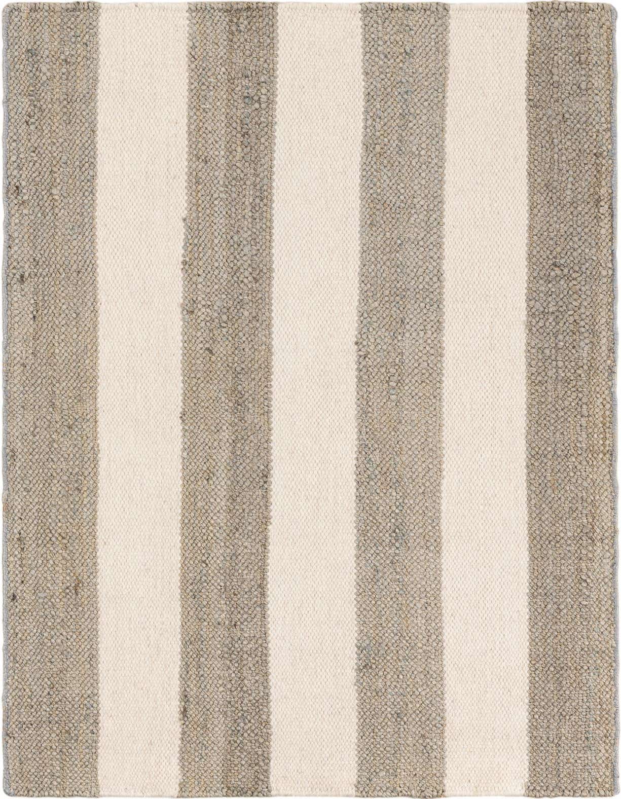 A 3x5 rectangular Jill Zarin Hamptons rug with wide alternating stripes of natural gray jute and creamy white wool, showcasing its textured flatweave.