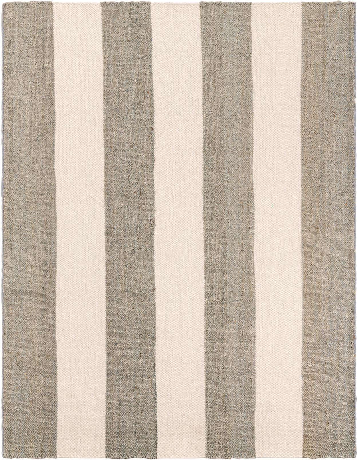 A 5x8 rectangular Jill Zarin Hamptons rug featuring wide alternating stripes of natural gray jute and creamy white wool.