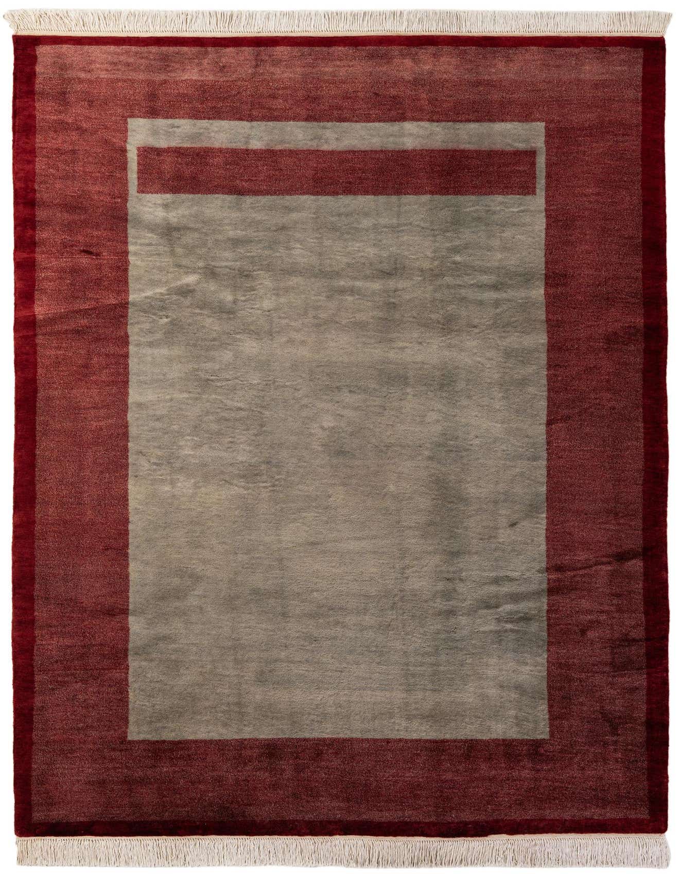 A 6x9 rectangular Kashkuli Gabbeh rug featuring a solid gray center with a wide red border and thin red accent stripe, suitable for a living room.