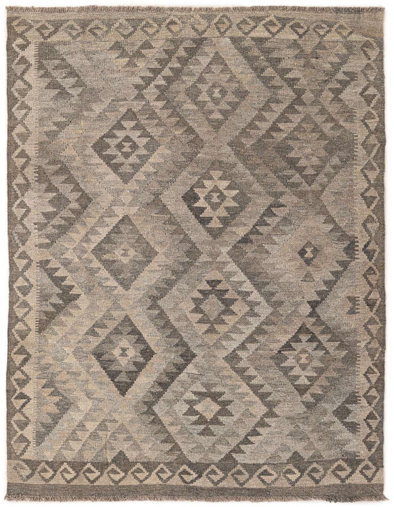 A 4x6 rectangular gray wool flatweave rug with a tribal diamond pattern, ideal for a living room.
