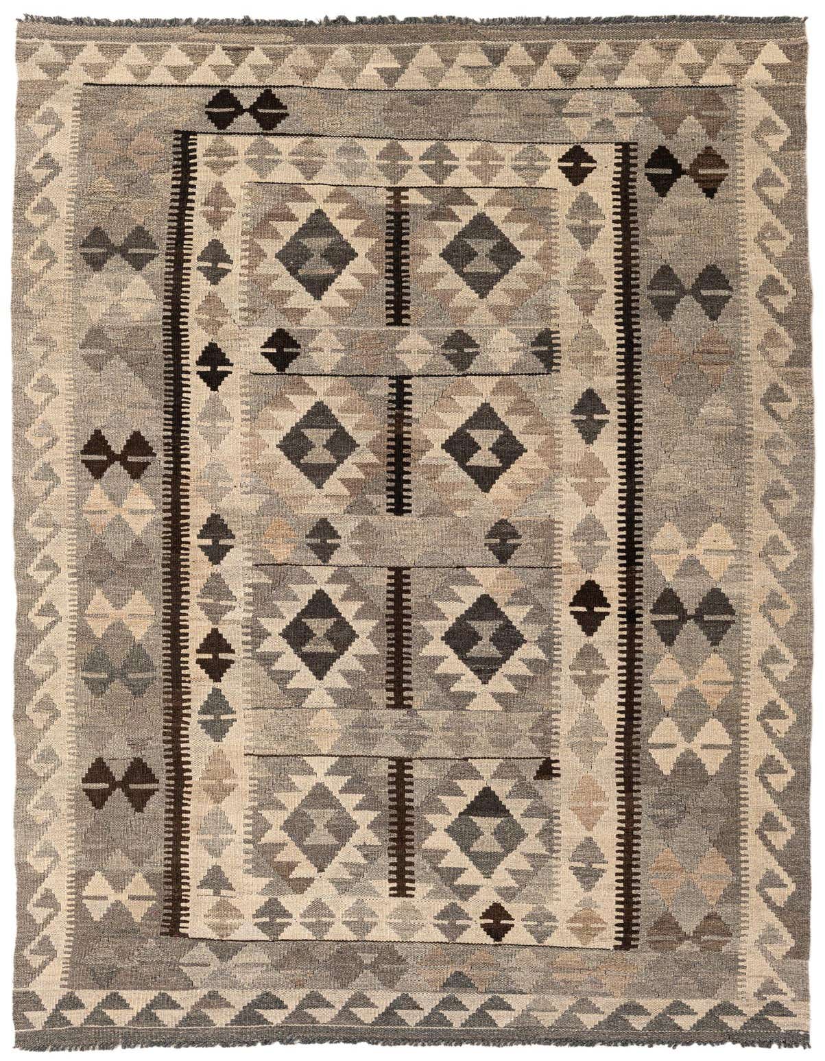 A 5x7 rectangular Kilim Maymana rug featuring a tribal geometric pattern in various shades of gray and cream.