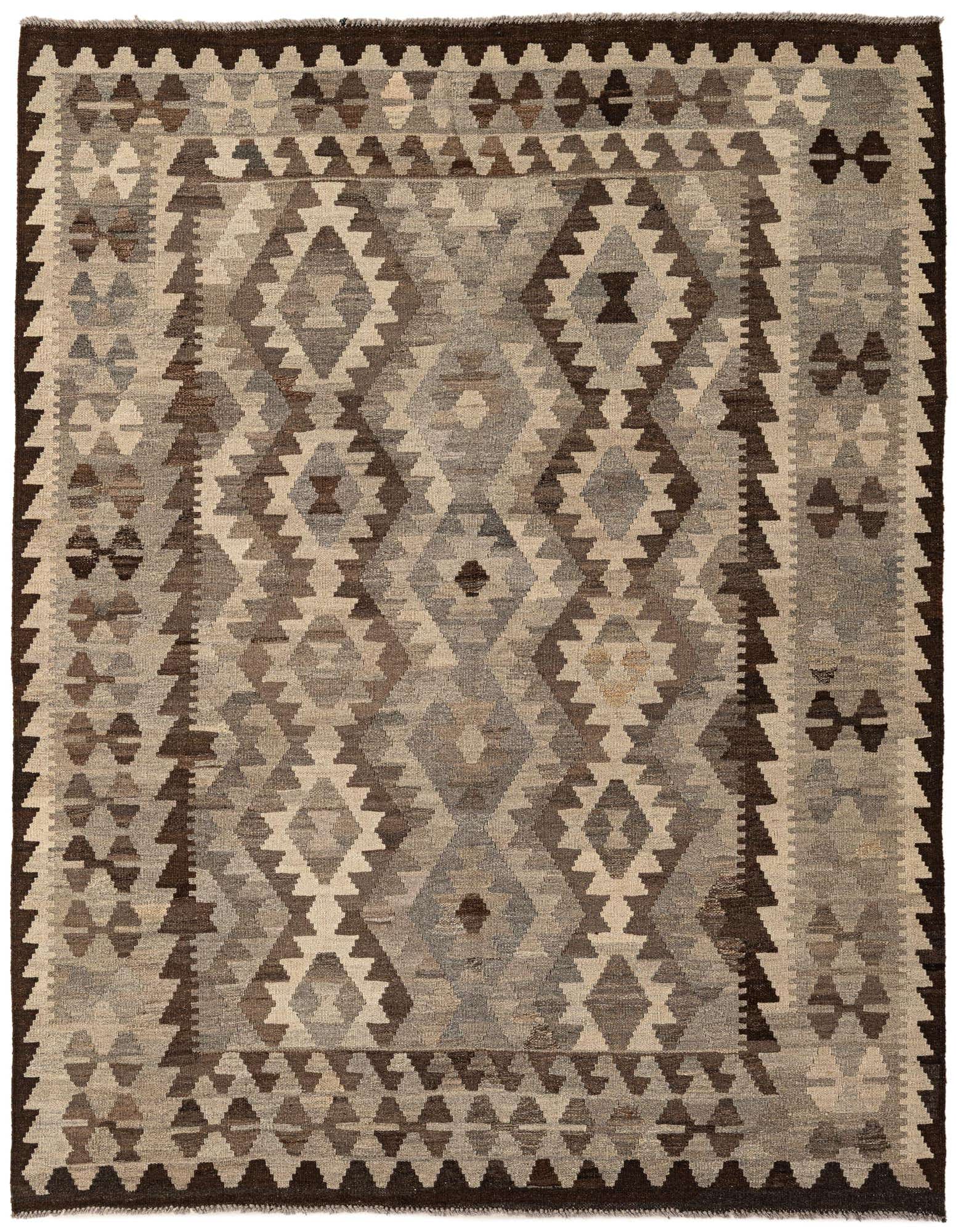 A 5x7 rectangular Kilim Maymana rug featuring a tribal geometric pattern in shades of gray, silver, and brown, perfect for an indoor living space.