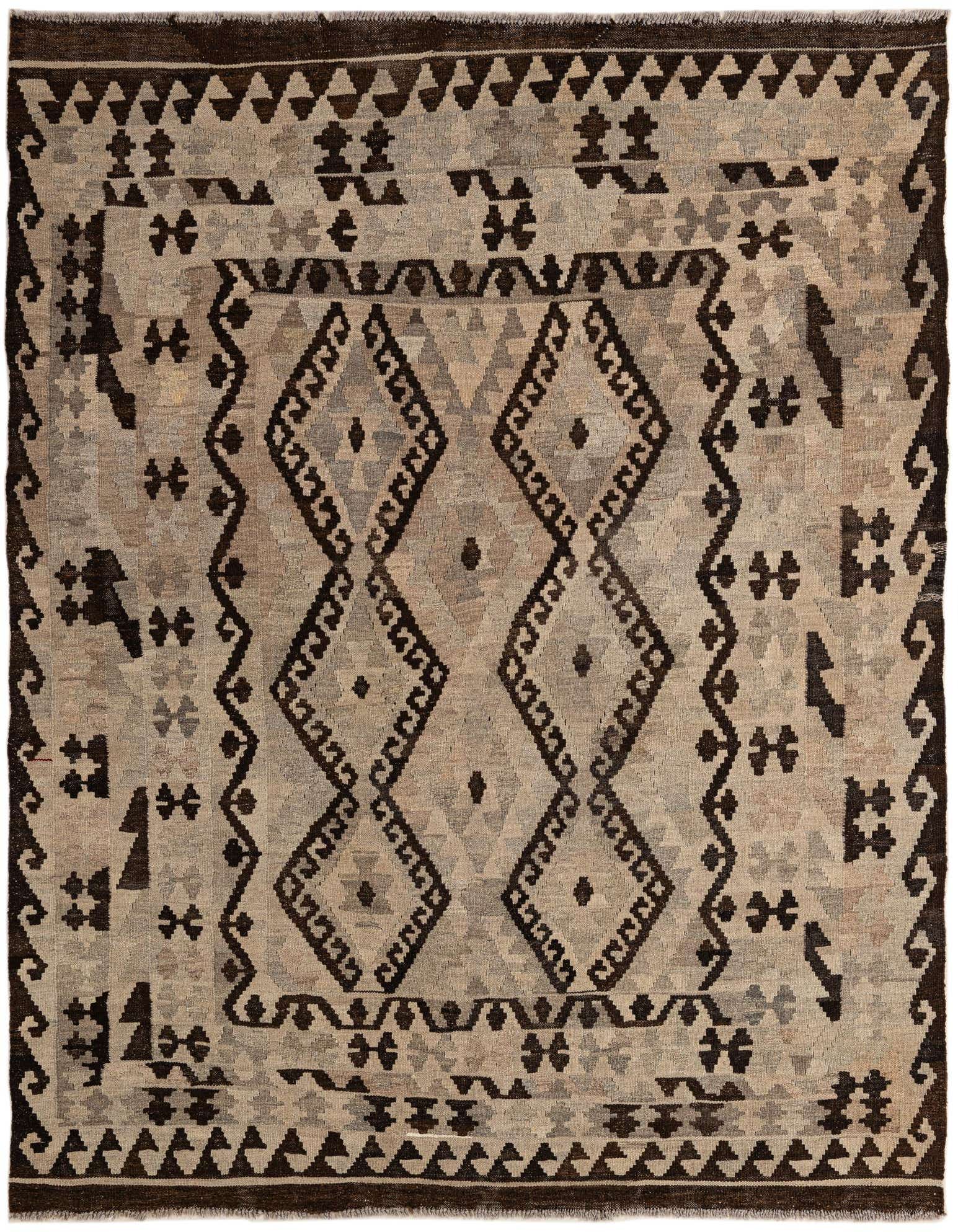 A 5x7 rectangular Kilim Maymana rug featuring a tribal geometric pattern in shades of gray and dark brown, handmade from wool.
