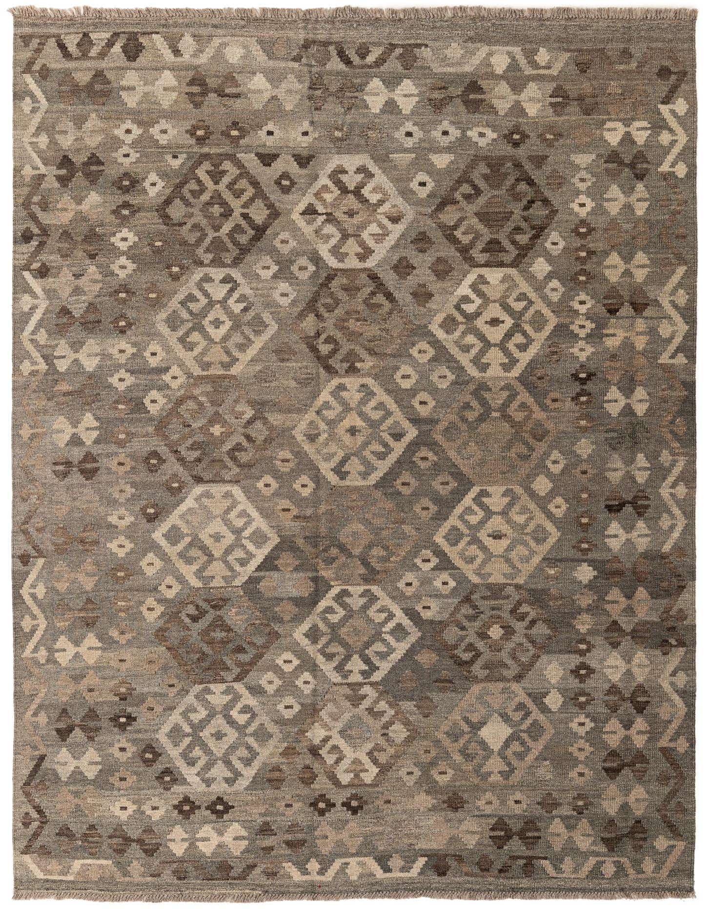 A 6x9 rectangular Kilim Maymana rug featuring a tribal geometric pattern in varying shades of gray and silver.