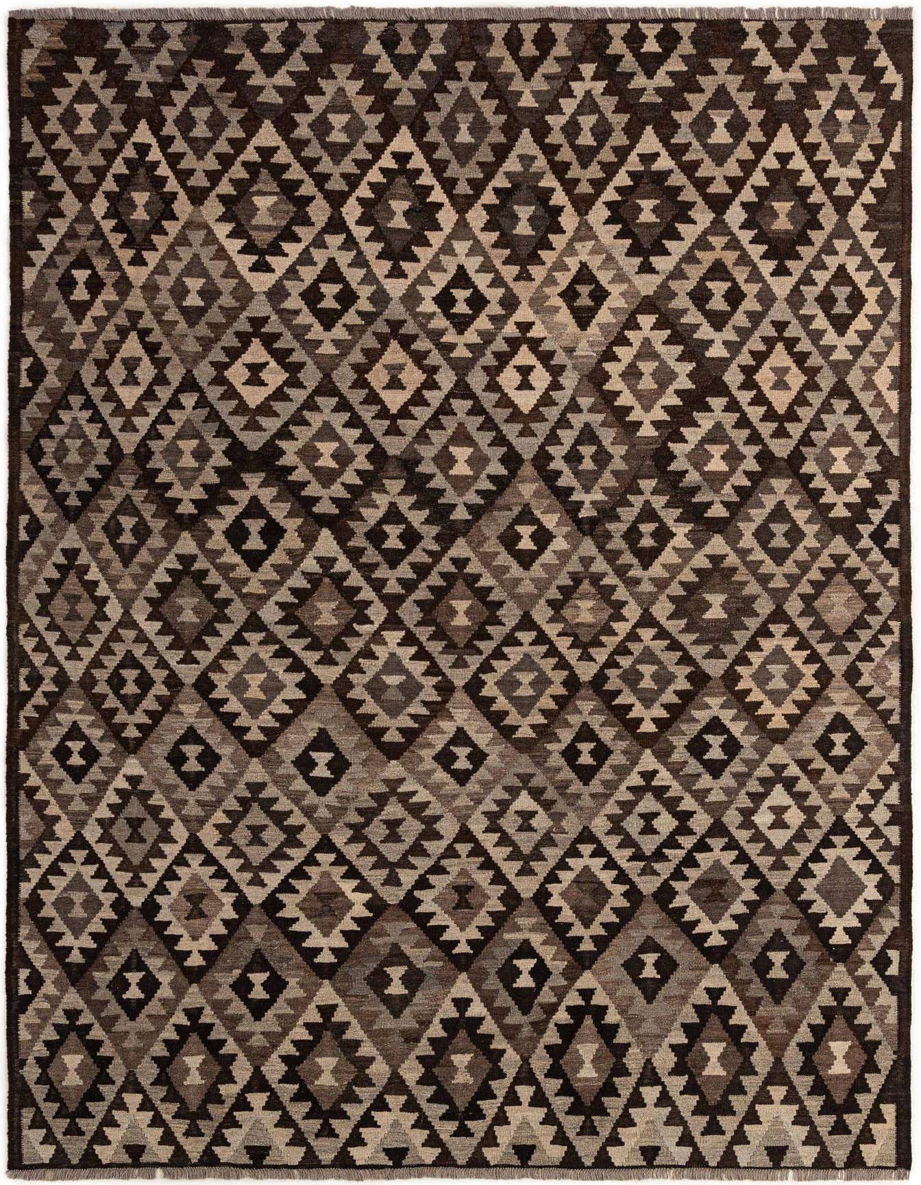 A 7x10 rectangular flatweave rug with a tribal geometric pattern in varying shades of gray, silver, and dark brown.