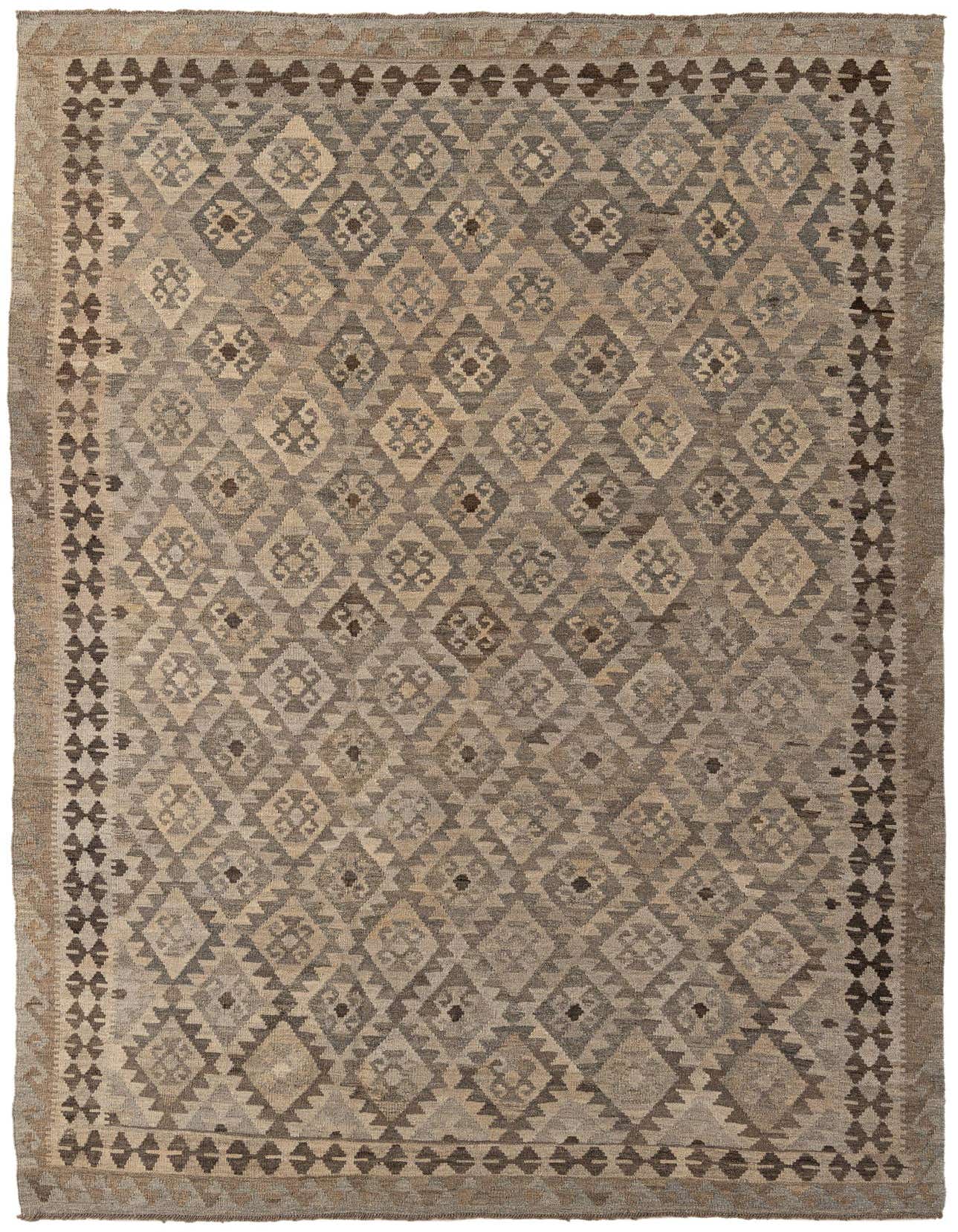 A 7x10 rectangular flatweave rug with a tribal geometric pattern in shades of gray and silver, suitable for a living room.