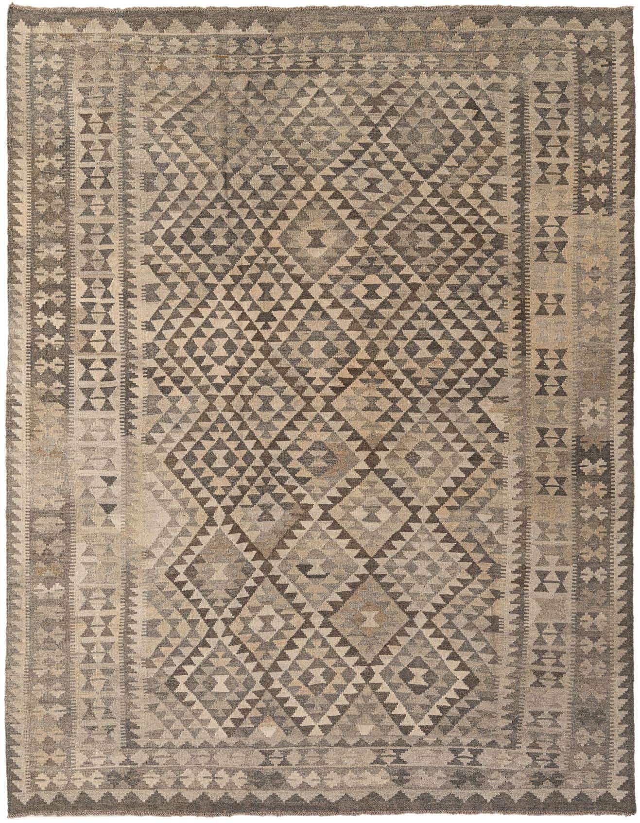 A 7x10 rectangular flatweave rug with a tribal geometric pattern in varying shades of gray and silver.