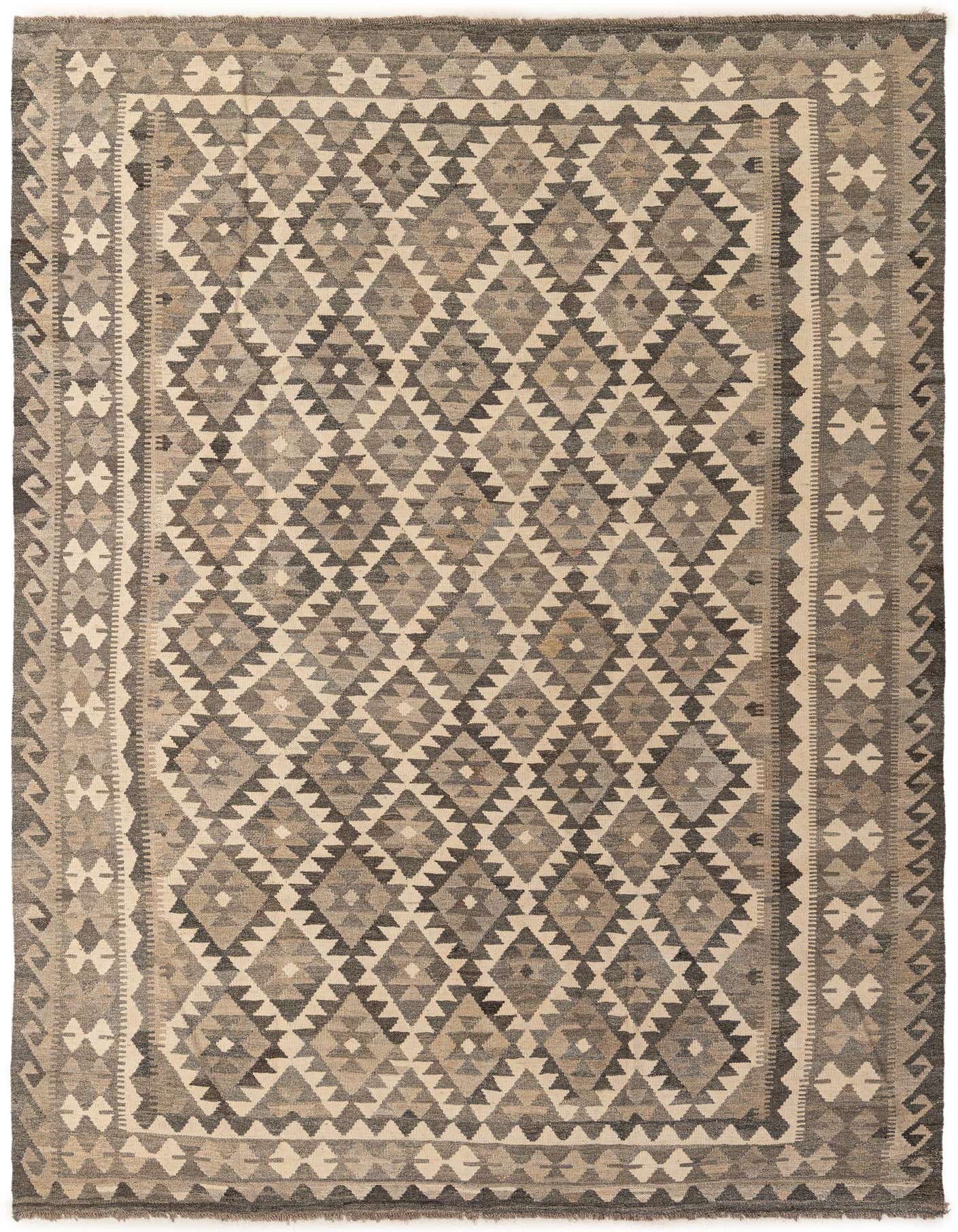 A 7x10 rectangular flatweave rug with a geometric tribal pattern in shades of gray and silver, perfect for a living room.