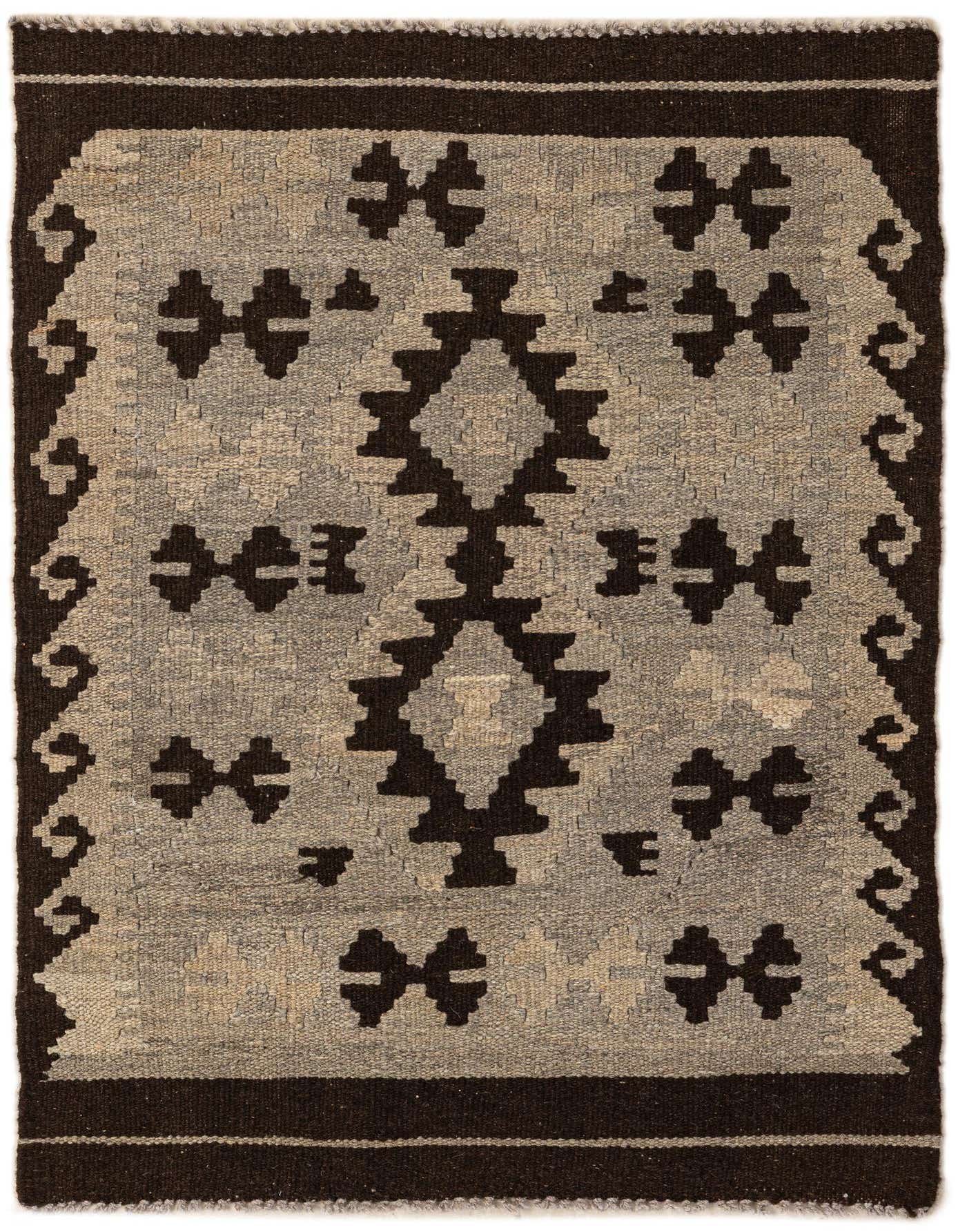 A 3x4 rectangular Kilim Maymana rug featuring a tribal geometric pattern in dark gray and light gray tones.