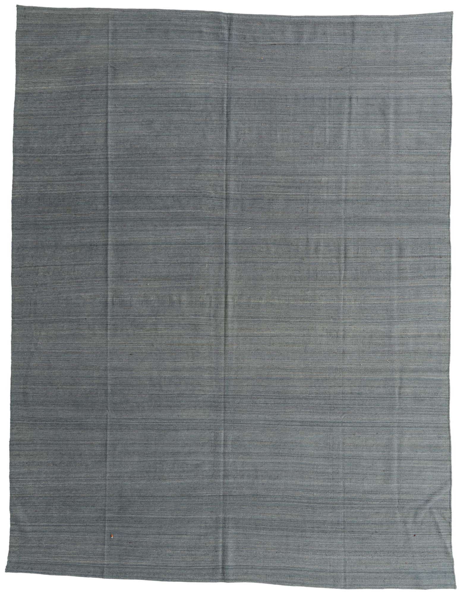 A 10x12 rectangular gray flatweave rug with subtle horizontal striations, showcasing its handmade wool texture.