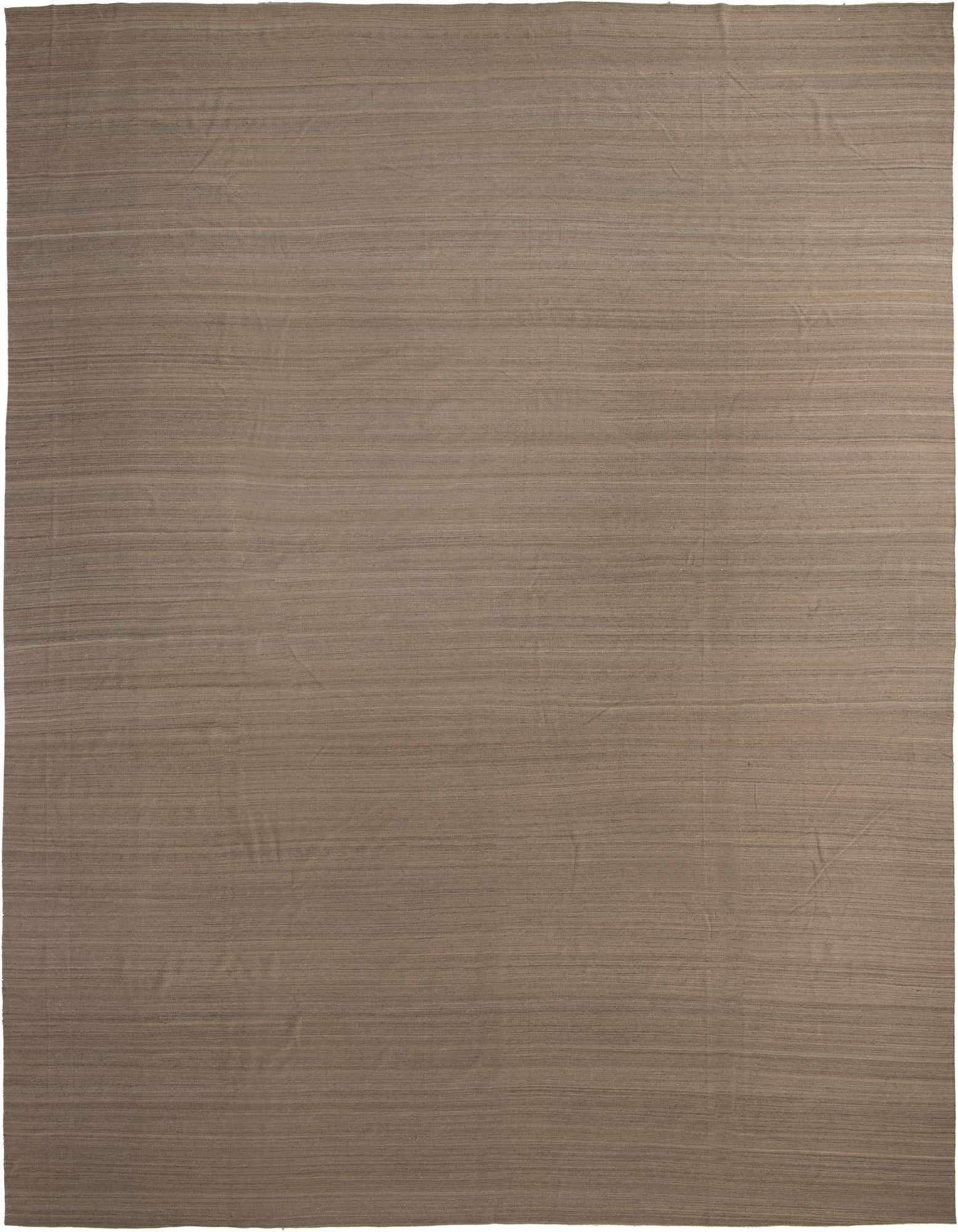 A large rectangular gray flatweave wool rug with subtle horizontal striations, suitable for a living room.