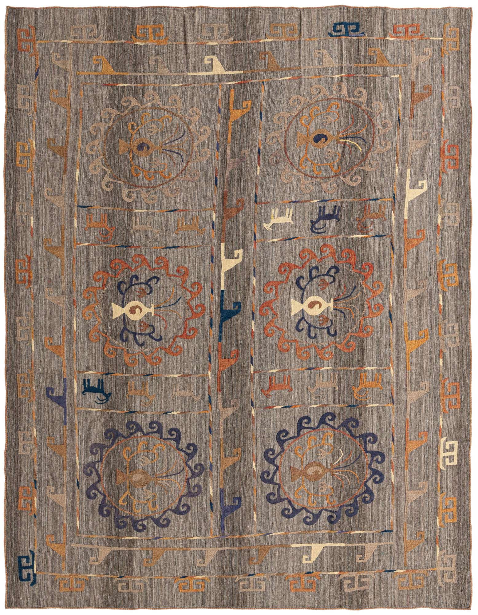 A rectangular 8x10 gray wool flatweave rug with a modern tribal pattern featuring abstract circular motifs and geometric shapes in orange, blue, and beige.