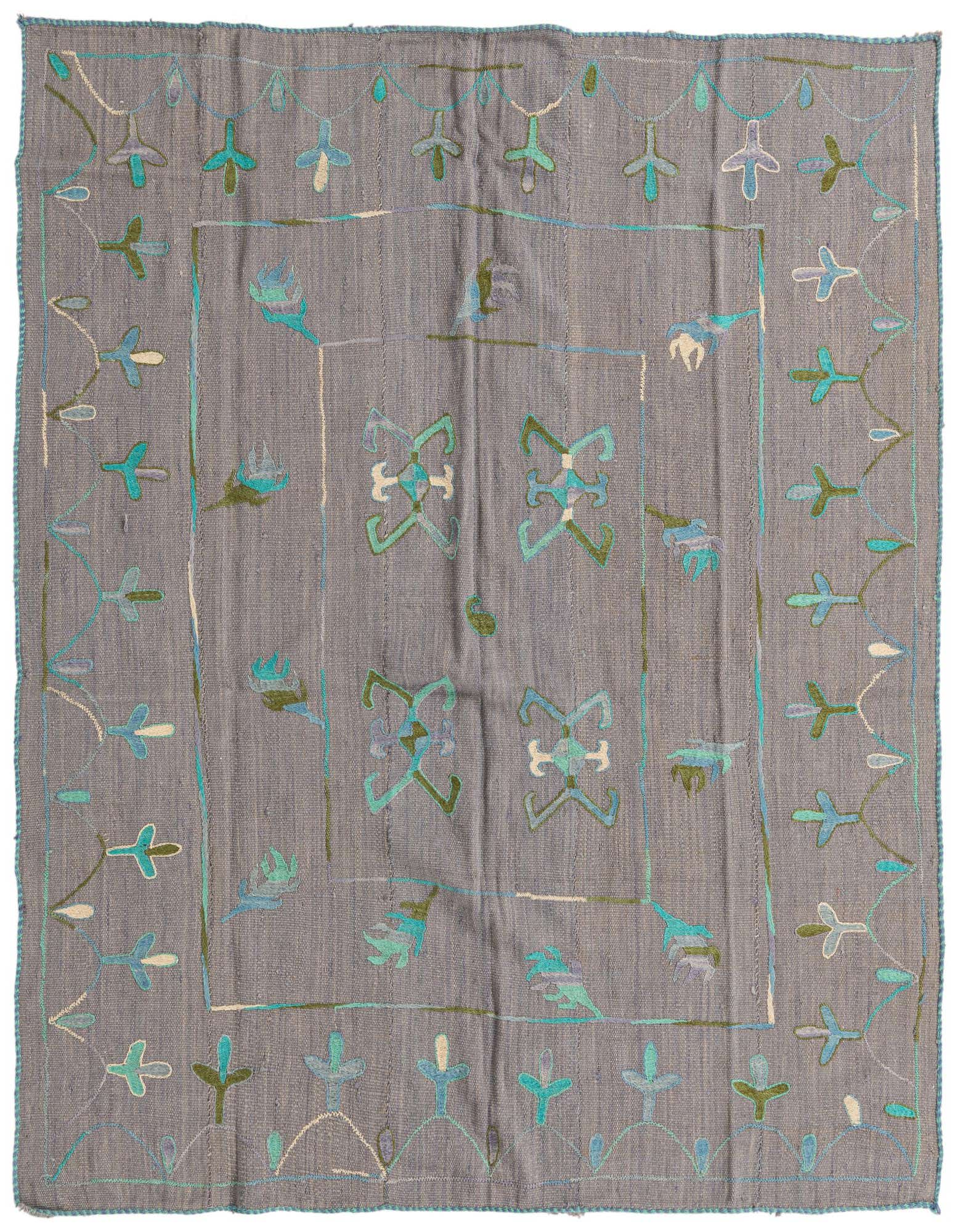 A 5x8 rectangular gray Kilim Suzani rug with a tribal pattern in teal, blue, green, and cream.