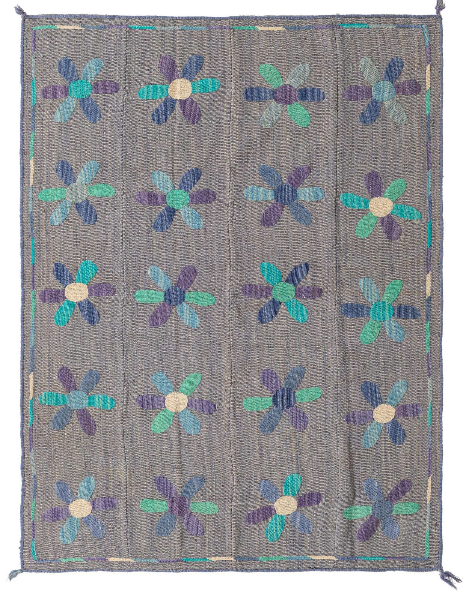 A 4x6 rectangular gray flatweave rug with a repeating pattern of colorful floral medallions in blue, purple, and teal.