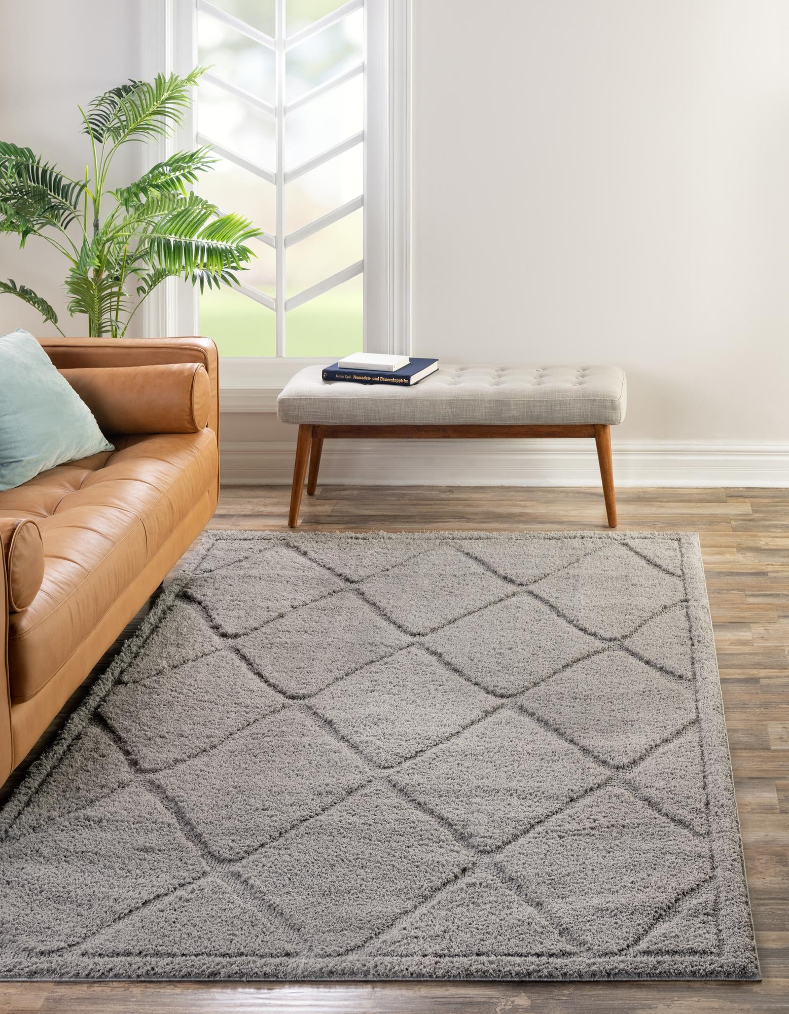 A 4x6 rectangular gray shag area rug with a subtle high-low textured lattice pattern, perfect for a living room.