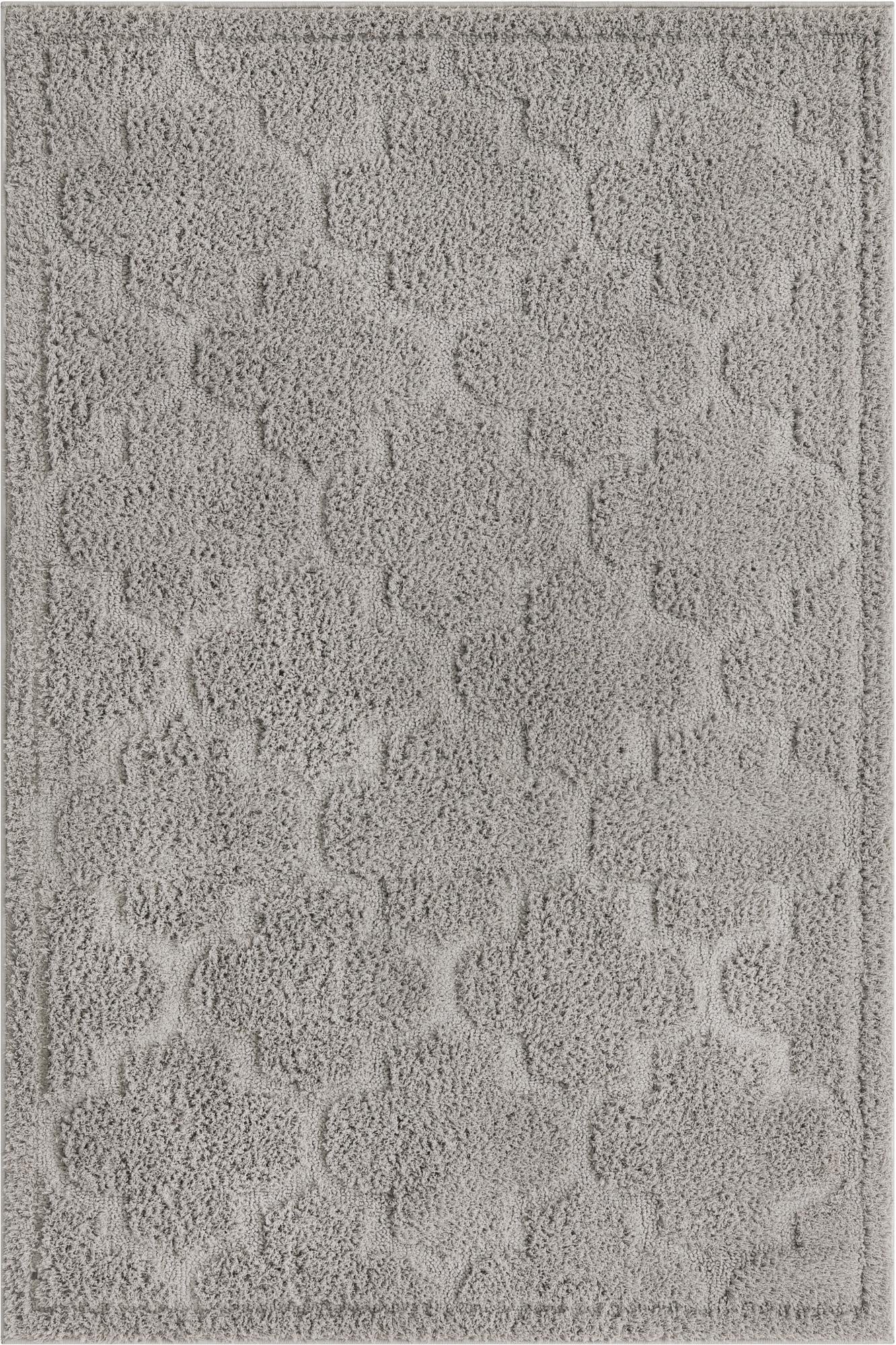 A 4x6 rectangular gray shag rug with a subtle high-low textured lattice pattern, perfect for a living room.