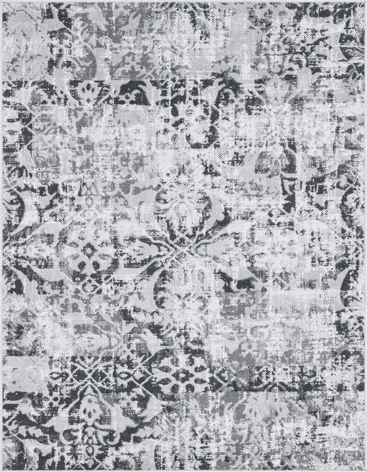 A 5x8 rectangular Lucerne rug featuring a distressed bohemian and botanical pattern in various shades of gray and silver.