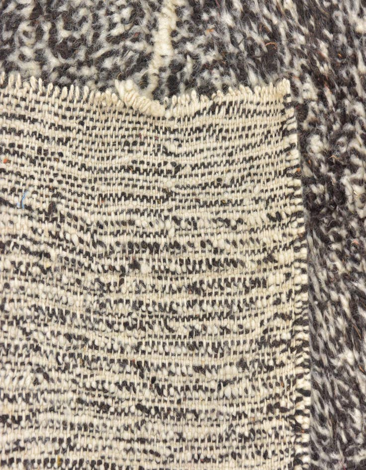 Detail image of  4' 10 x 7' 10  Hand Knotted Moroccan Wool Rug