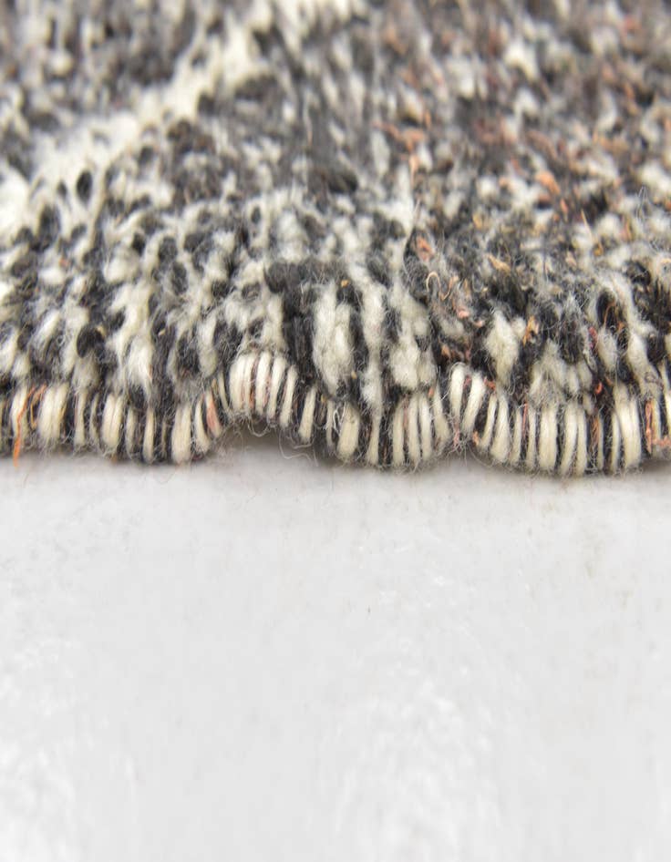 Detail image of  4' 10 x 7' 10  Hand Knotted Moroccan Wool Rug