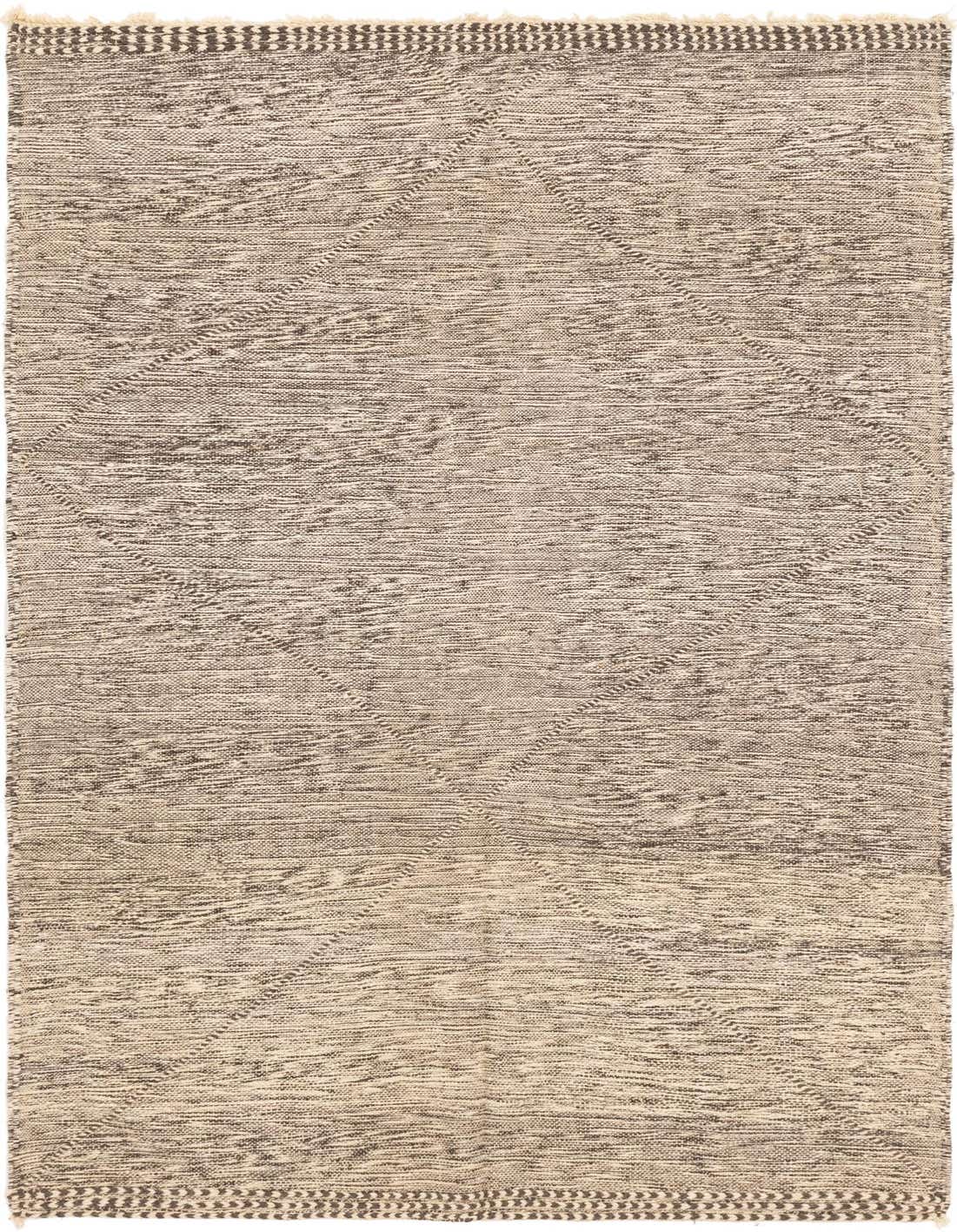 A 5x8 rectangular gray and silver tribal shag rug with a subtle diamond pattern and fringed edges, perfect for a modern living room.