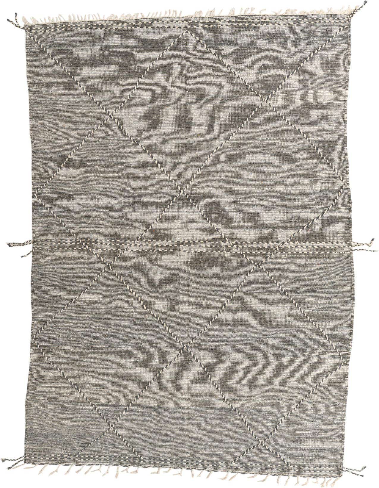 A 7x10 rectangular gray wool shag rug with a modern tribal diamond pattern and fringe.