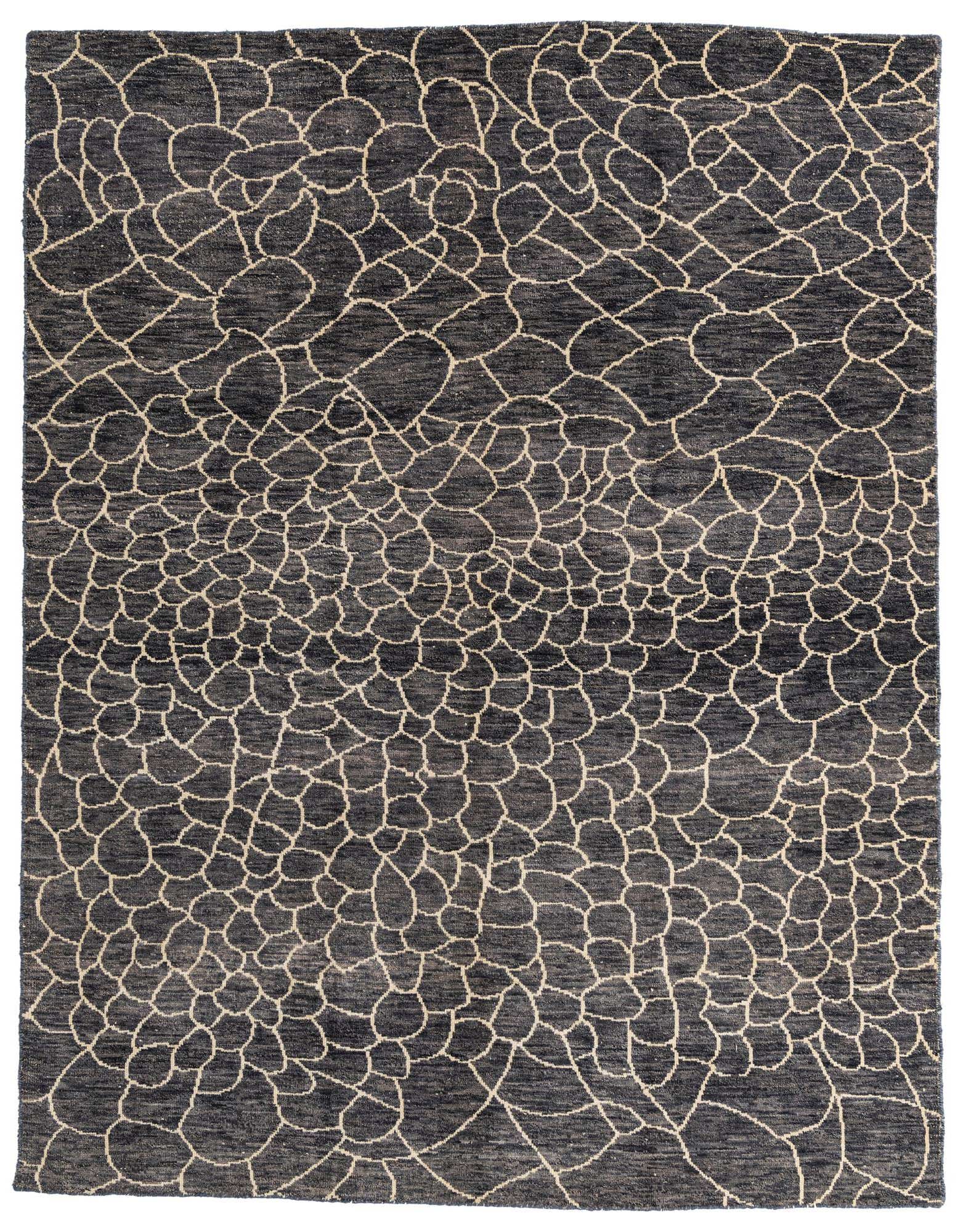 A rectangular 8x10 gray wool shag rug featuring an abstract tribal pattern of interconnected light beige lines.