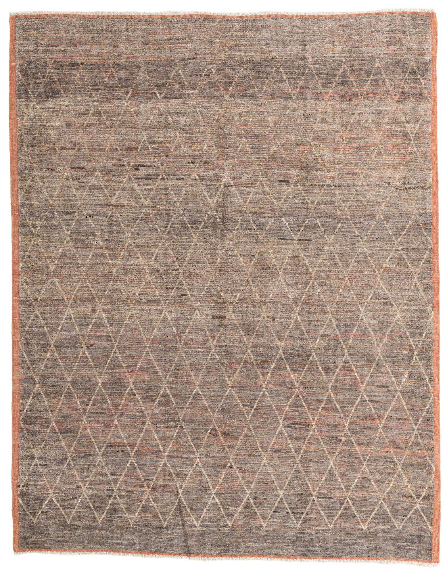 A 9x12 rectangular gray wool shag rug with a subtle diamond tribal pattern and a thin orange border.