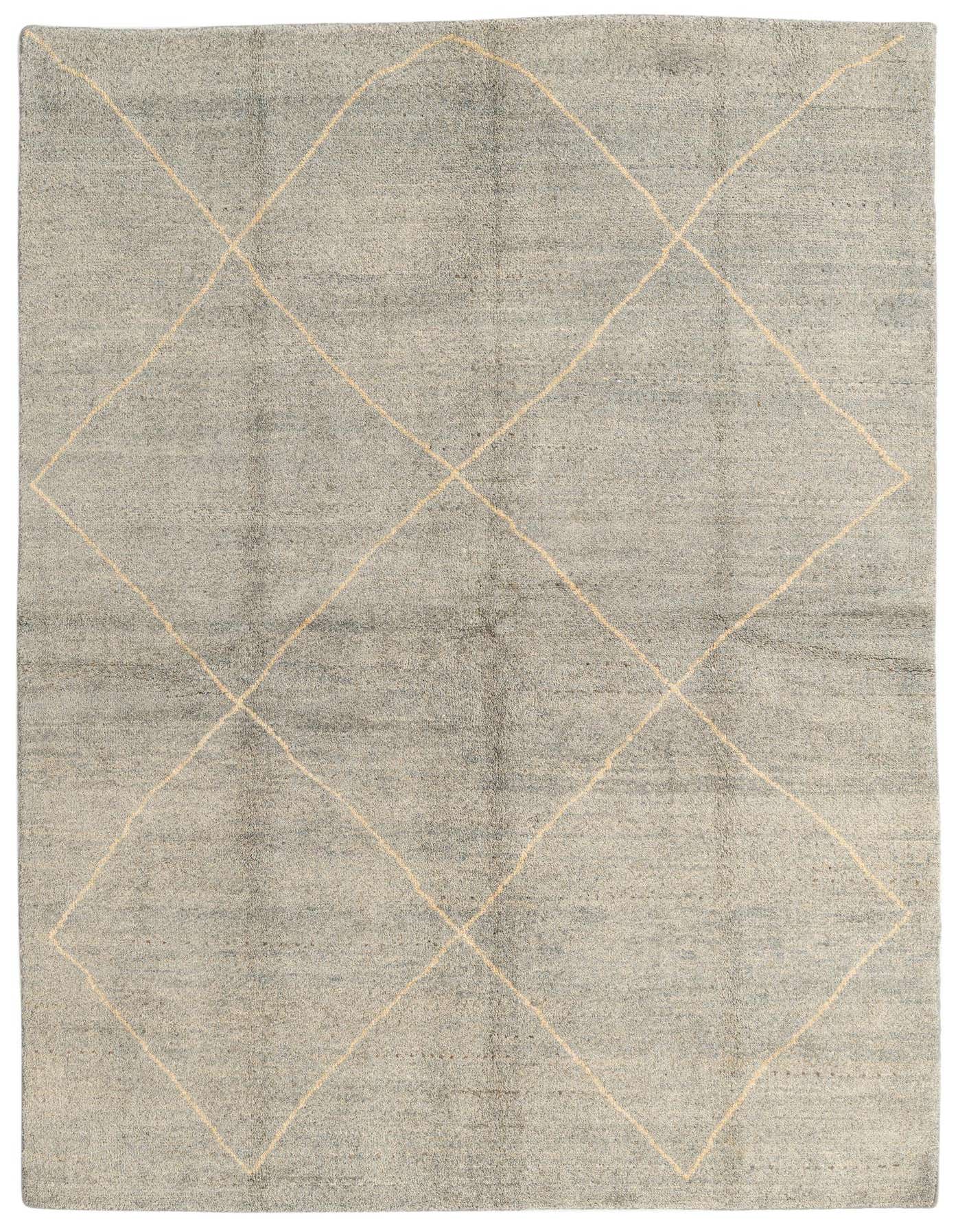 A 6x9 rectangular gray shag rug with a cream tribal diamond pattern, ideal for a modern living room.