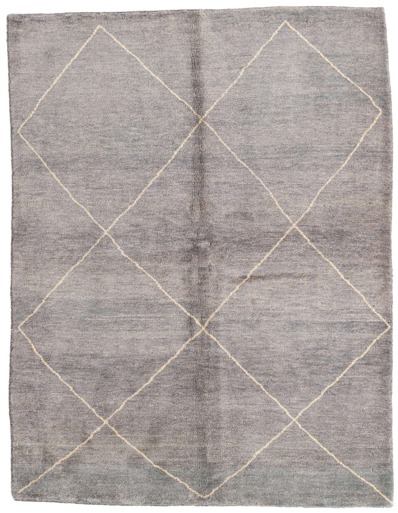 A 6x9 rectangular gray shag rug with a cream tribal diamond pattern, ideal for a living room or bedroom.