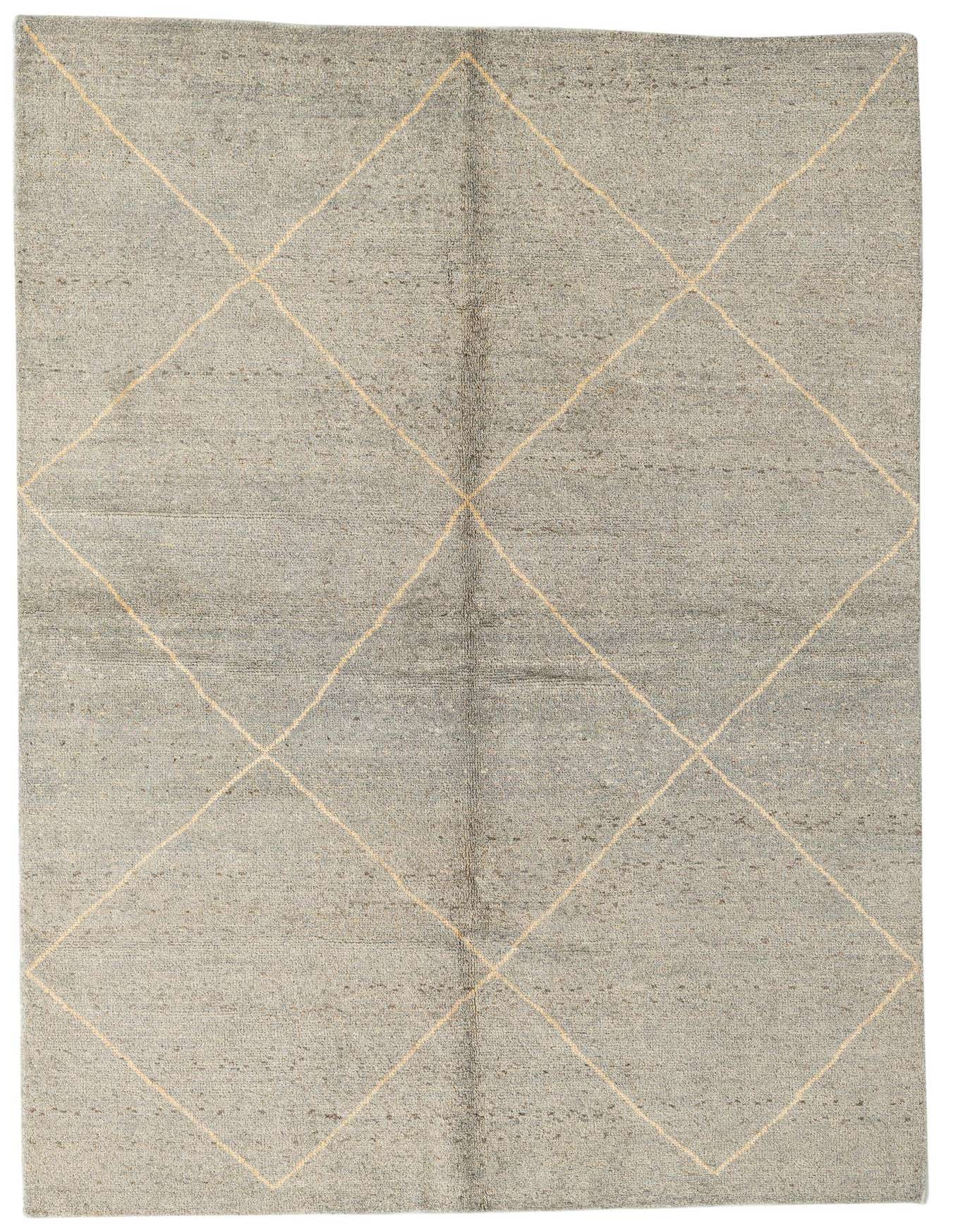 A 6x9 rectangular gray shag rug with a modern tribal diamond pattern in light beige, suitable for a living room.