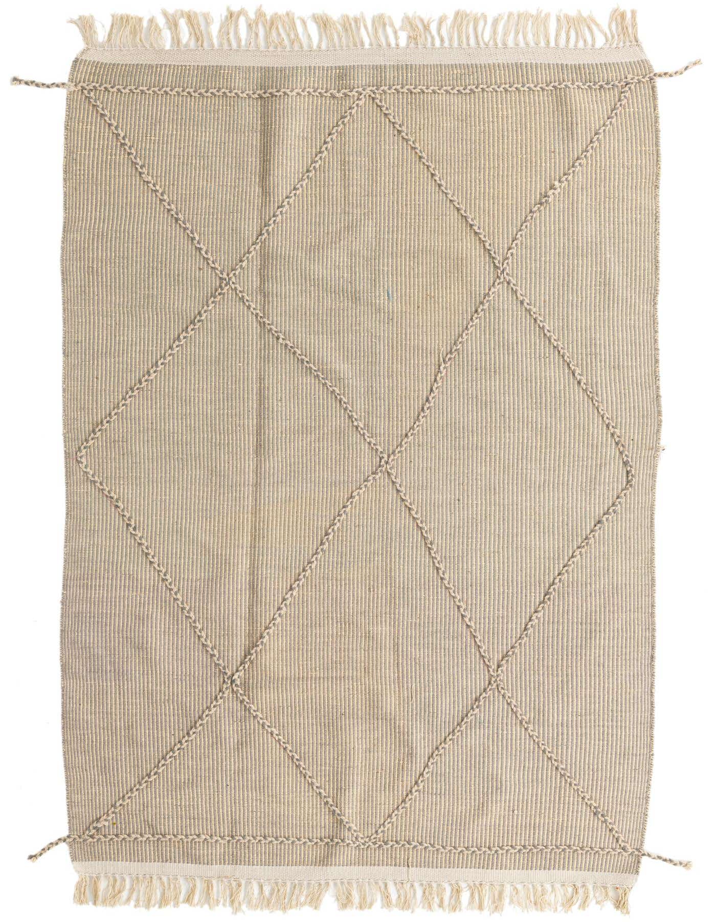 A 5x8 rectangular gray wool shag rug with a modern tribal diamond pattern and fringe, suitable for a living room.