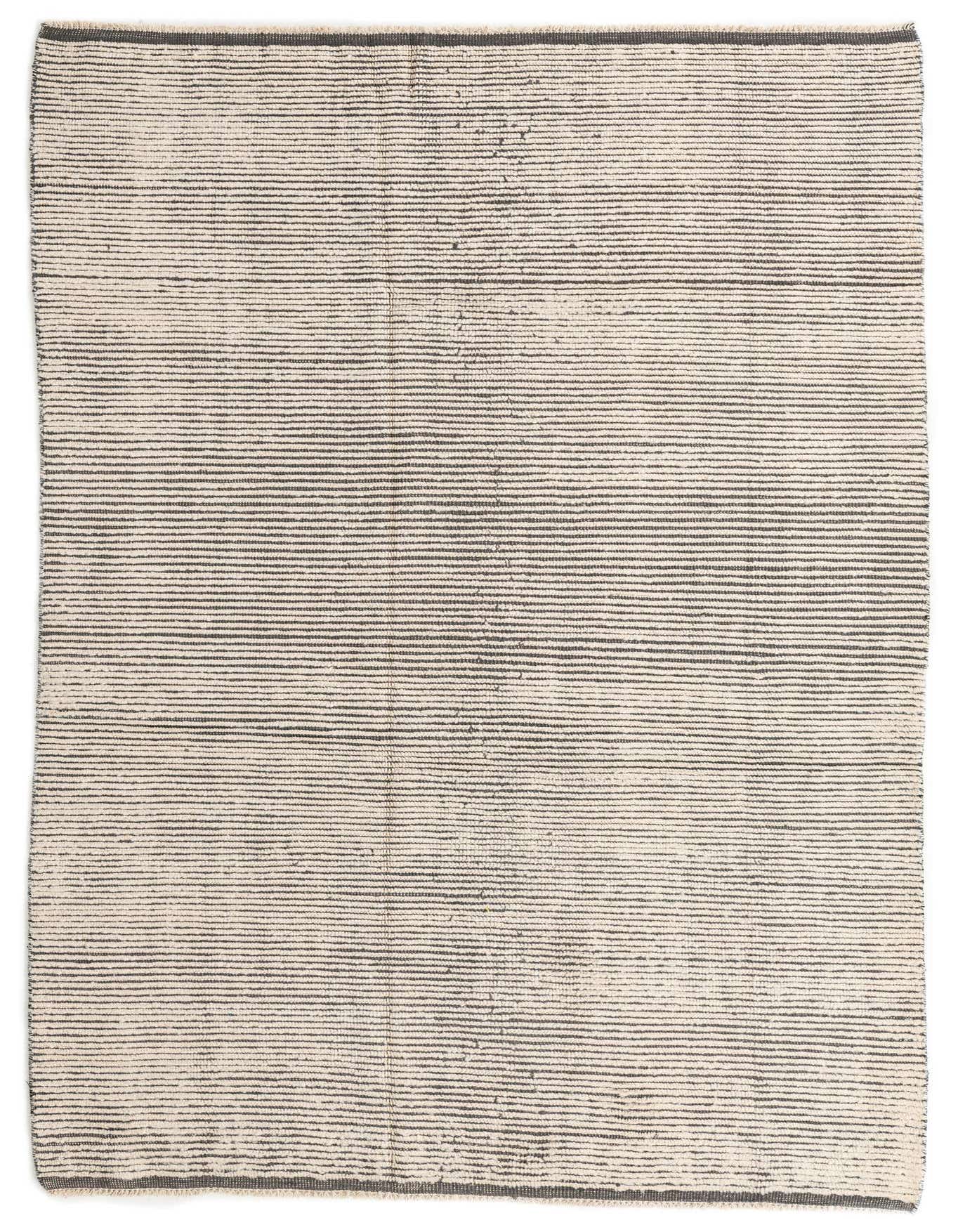 A 6x9 rectangular gray and off-white shag rug with thin horizontal tribal stripes, perfect for a modern living room.