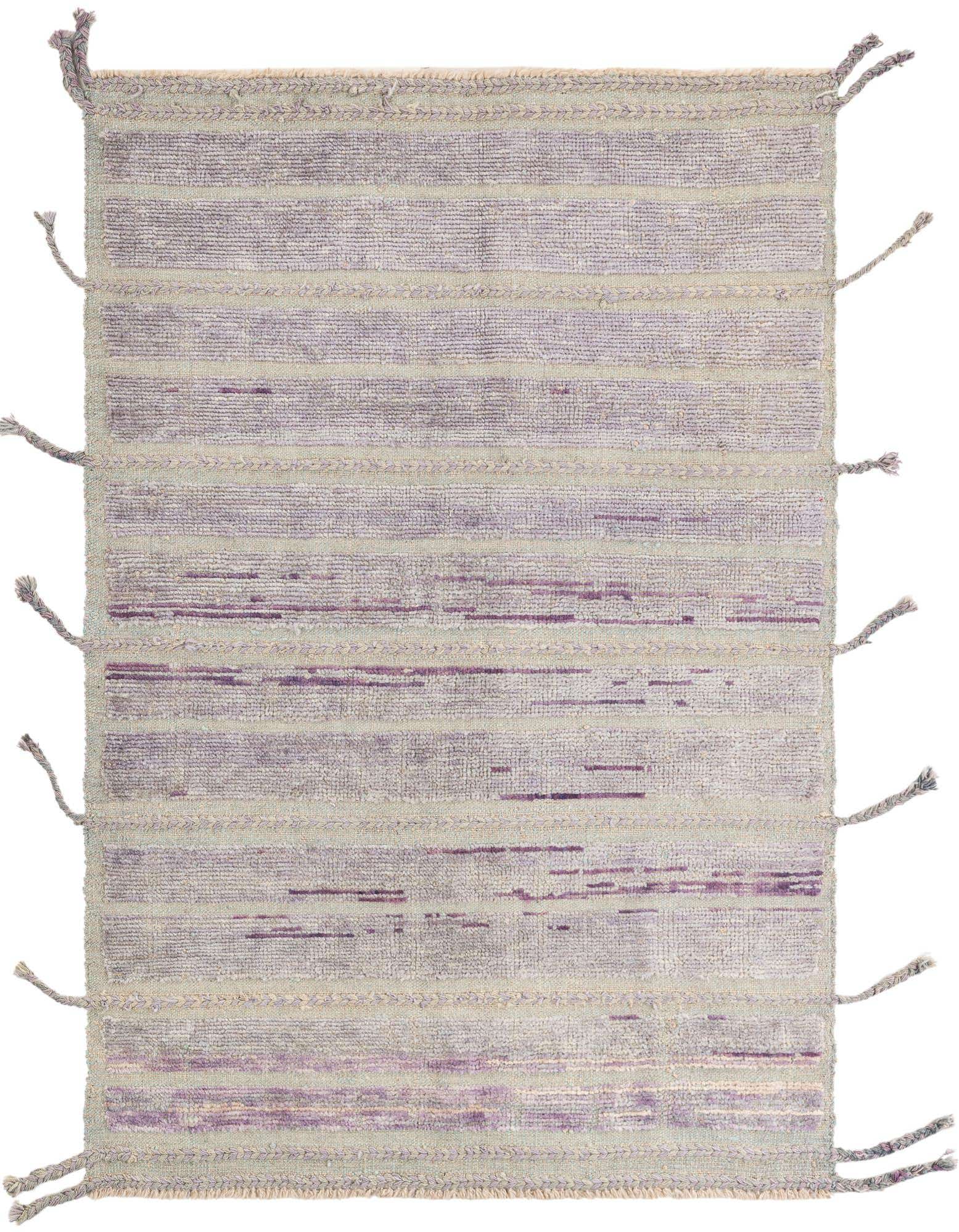 A 4x6 rectangular gray tribal shag rug with subtle purple stripe accents and decorative tassels.