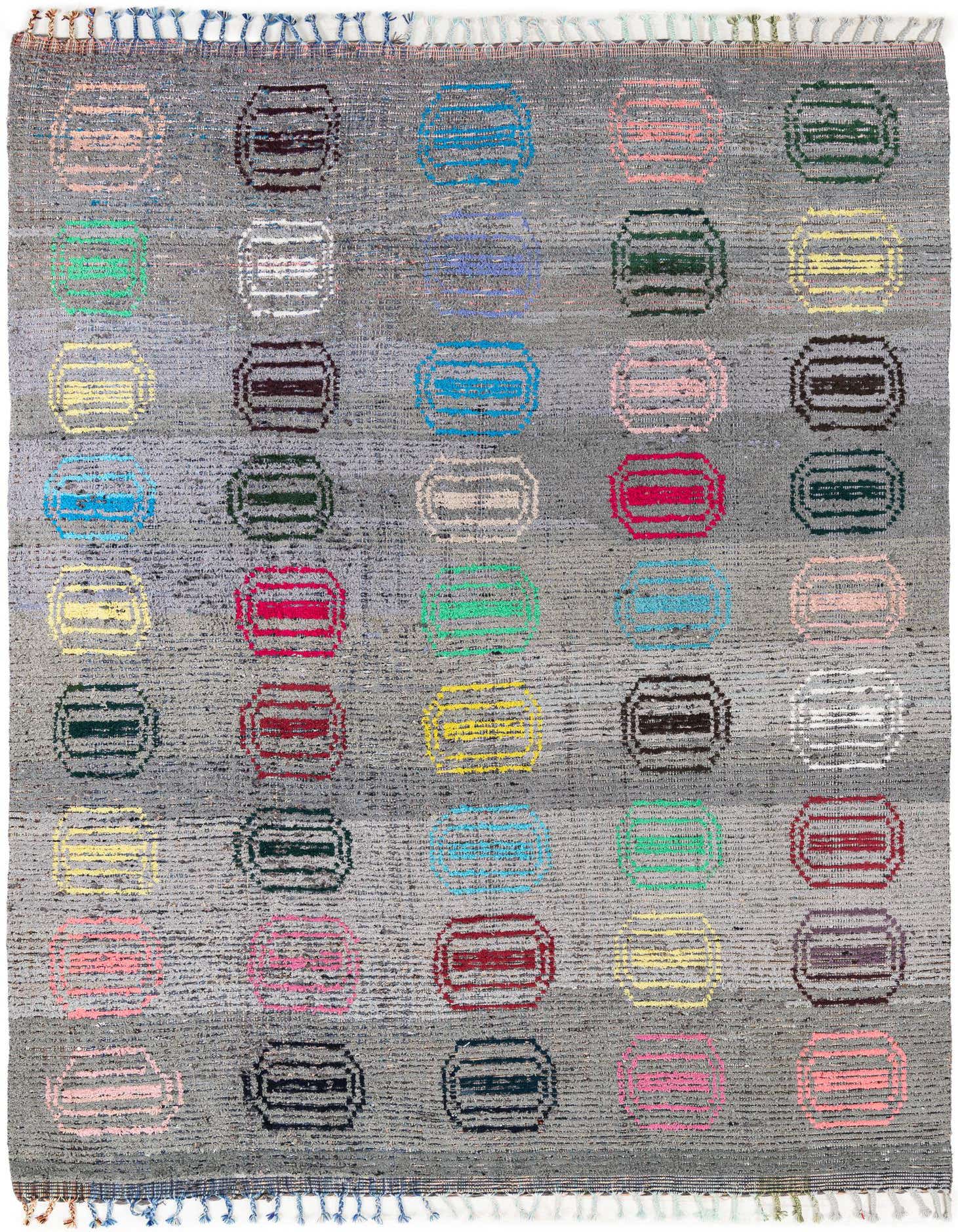 A rectangular 8x10 gray wool shag rug with colorful tribal oval patterns, ideal for a living room.