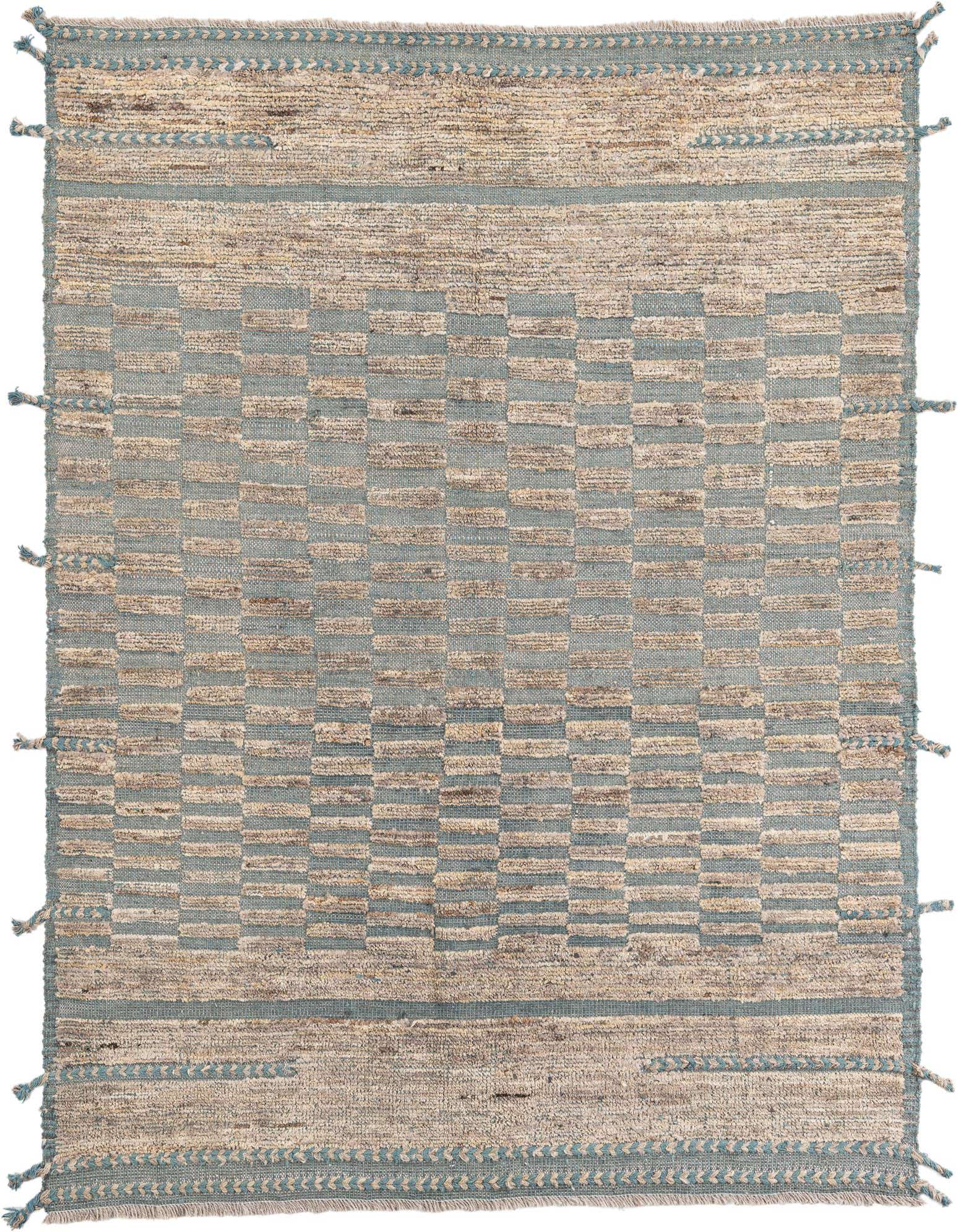 A 5x8 rectangular gray tribal wool shag rug with a modern striped pattern and tassels, perfect for a living room.
