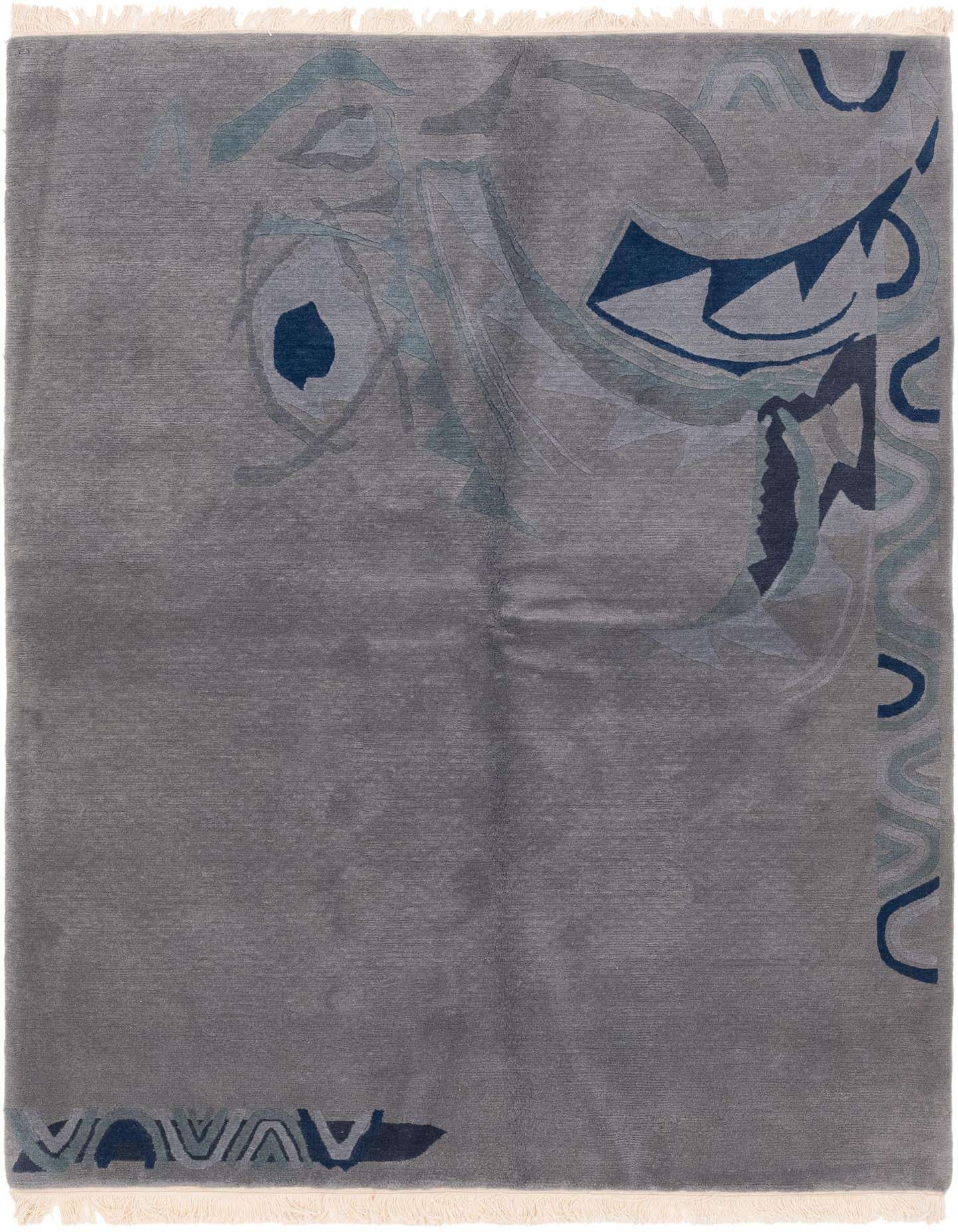 A 6x9 rectangular gray wool rug with a high pile, featuring an abstract, modern design in shades of blue and gray, with white fringe.