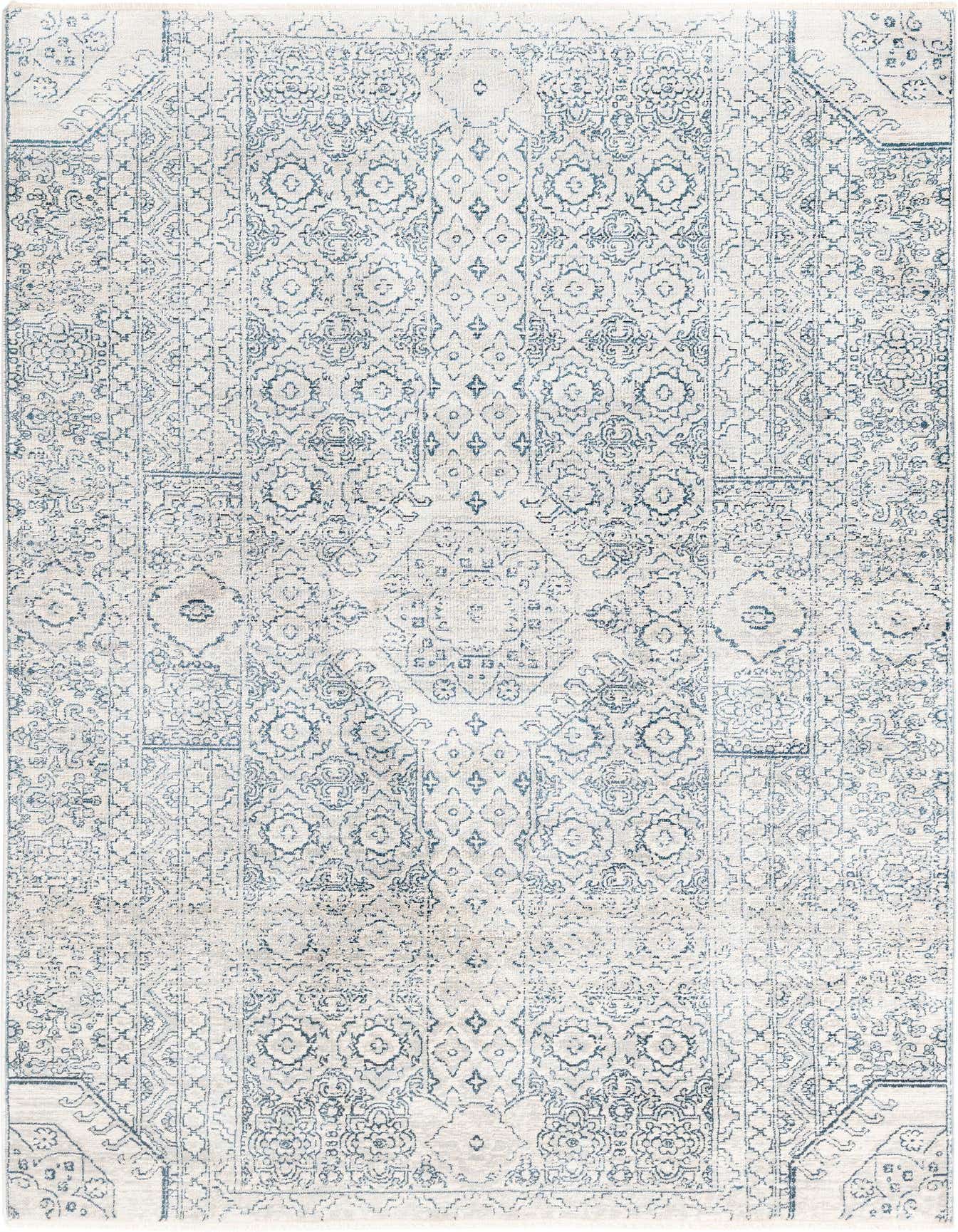 A 5x8 rectangular gray and silver area rug featuring a distressed traditional medallion and tribal pattern.