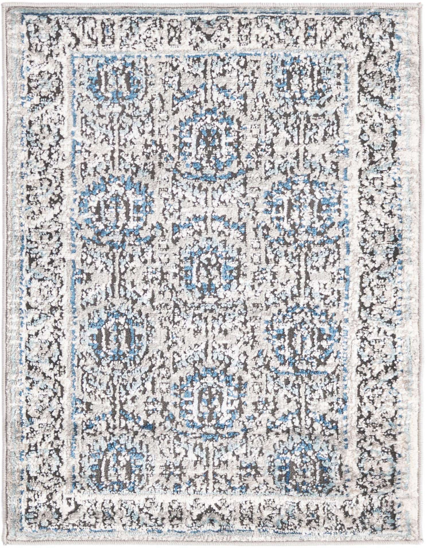 A 2x3 rectangular Nyla Collection rug featuring a distressed traditional medallion pattern in shades of gray, silver, and light blue.