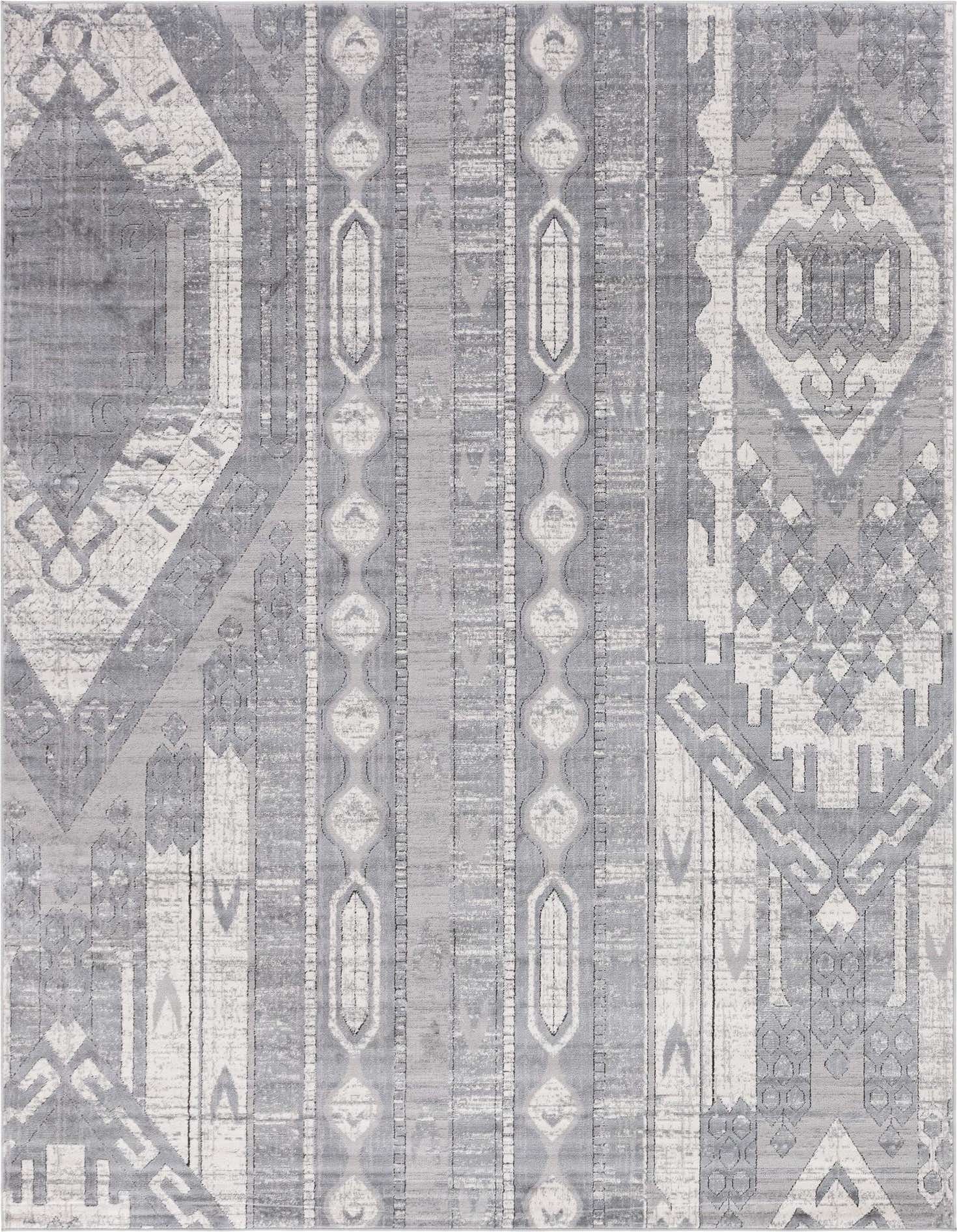 A large 8x11 rectangular area rug featuring a distressed bohemian and tribal pattern in various shades of gray and silver.
