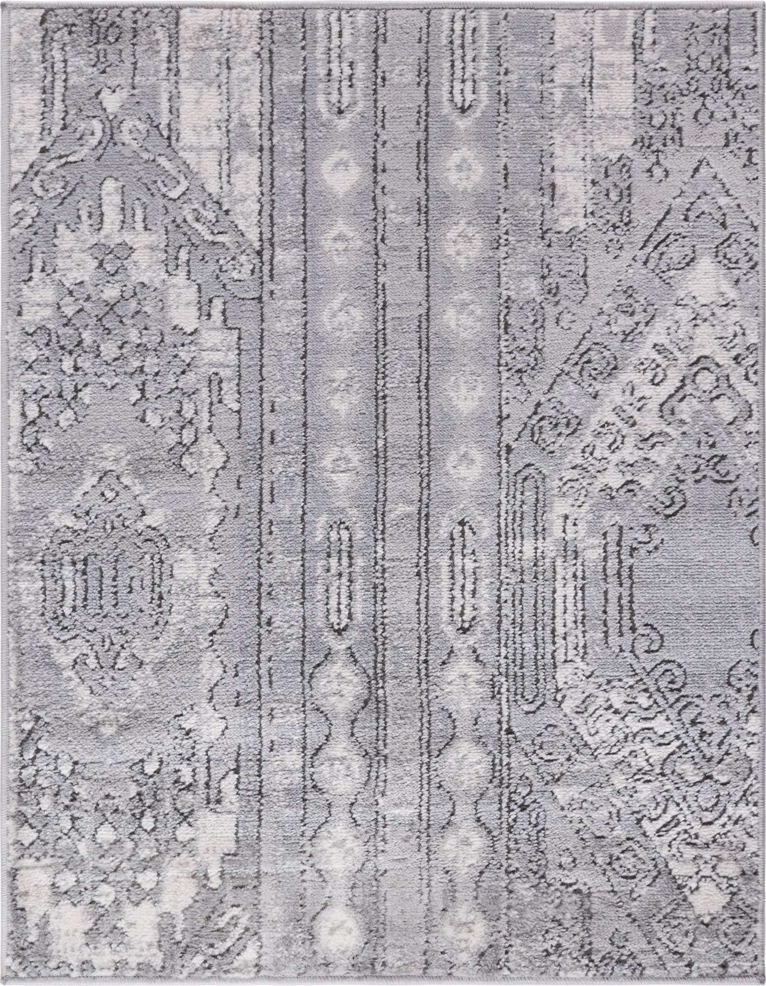 A 2x3 rectangular gray and silver area rug featuring a distressed bohemian and tribal pattern with stripes and geometric motifs.