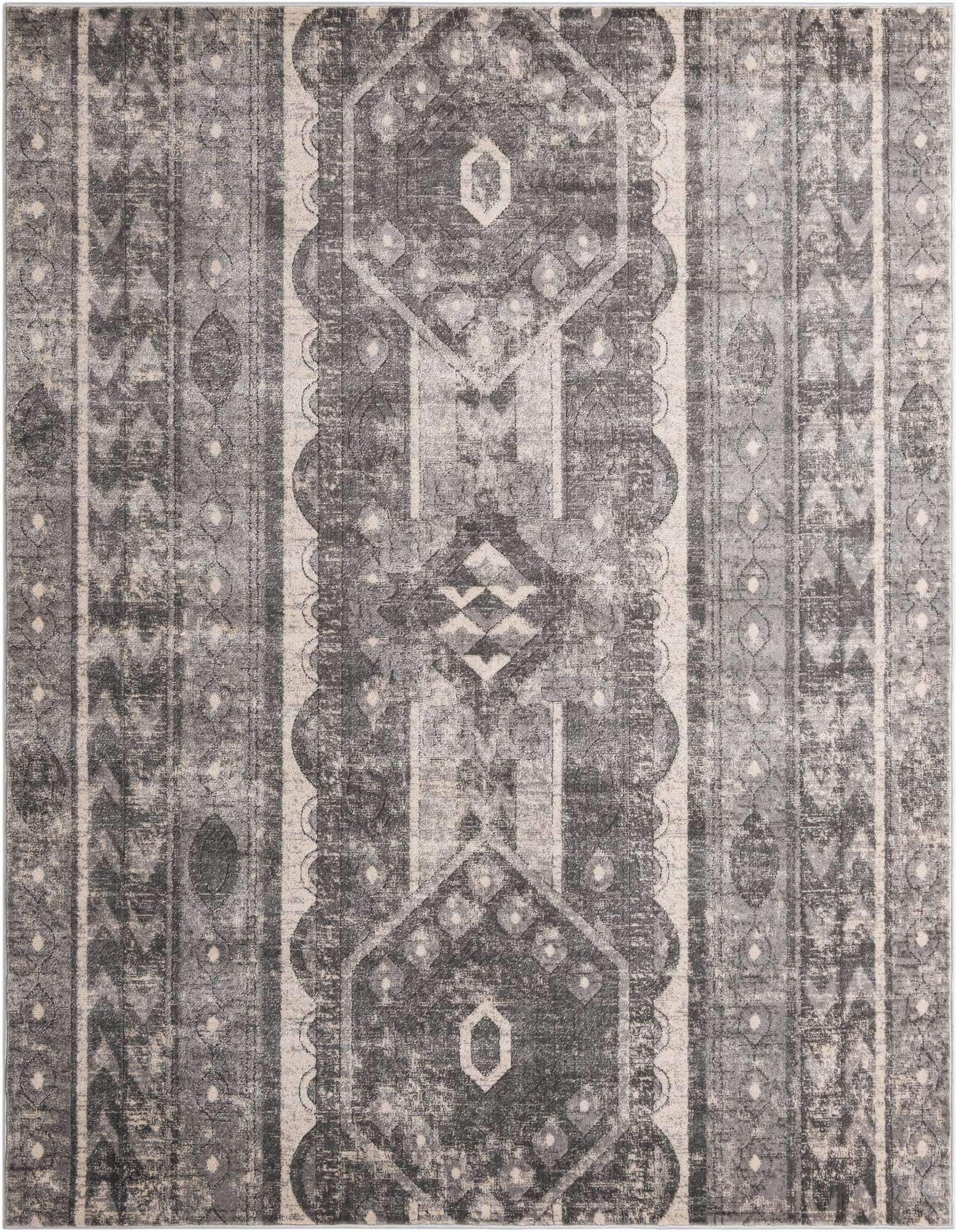 An 8x10 rectangular gray area rug with a distressed bohemian and tribal stripe pattern, featuring geometric motifs.
