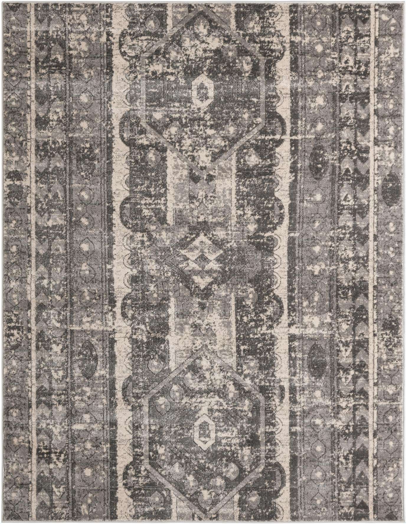 A 6x9 rectangular gray area rug featuring a distressed bohemian and tribal stripe pattern with geometric motifs.