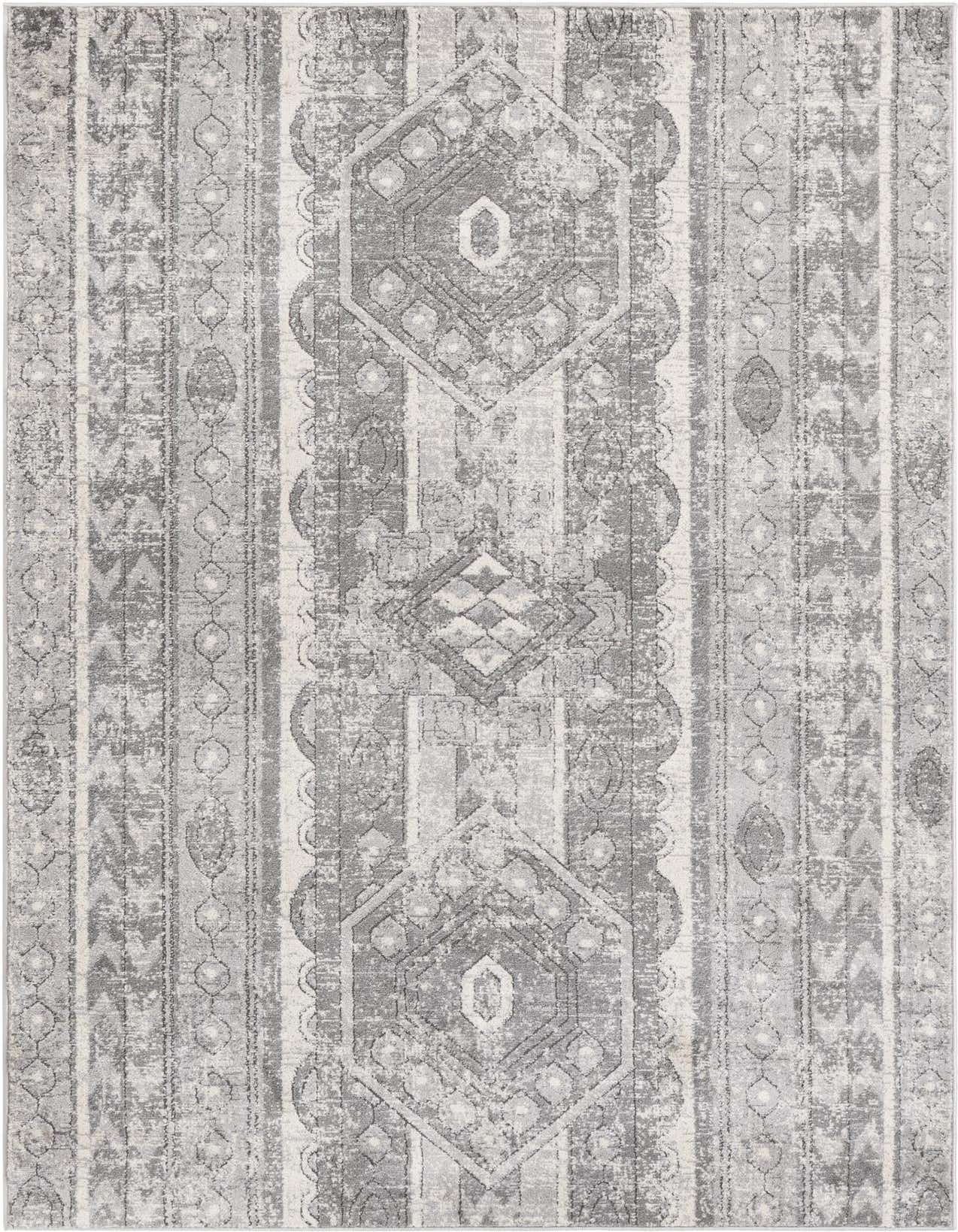A 5x8 rectangular gray area rug with a distressed bohemian and tribal stripe pattern, featuring geometric medallions.