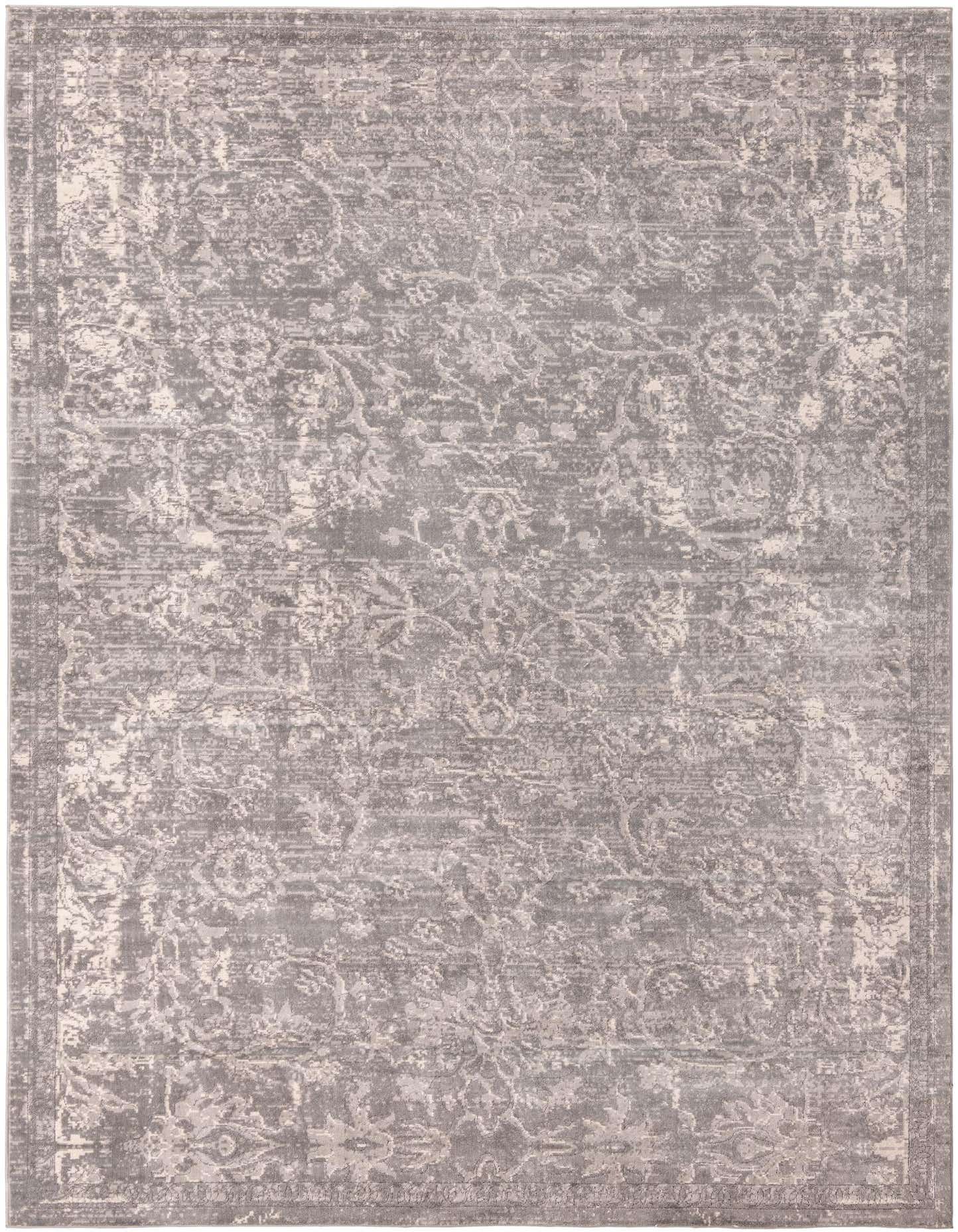 A 10x14 rectangular gray and silver shabby-chic rug with a distressed traditional botanical pattern, suitable for an indoor living space.