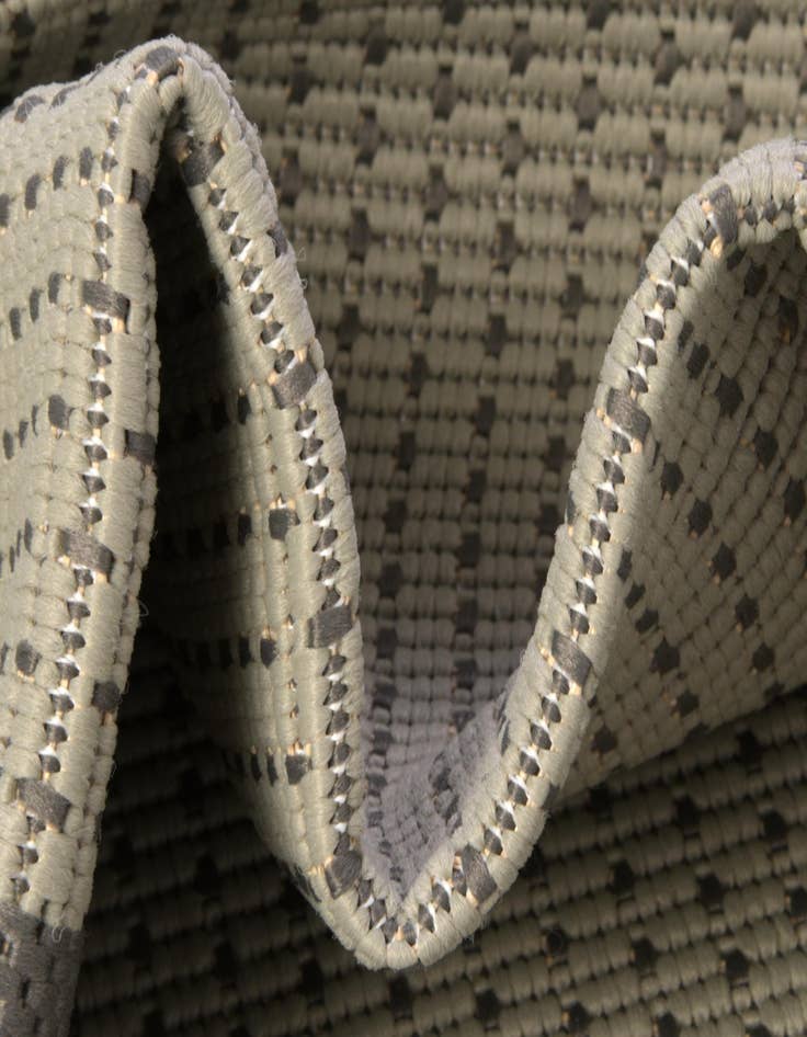 Detail image of  7' x 10'  Washable Border Indoor / Outdoor Rug