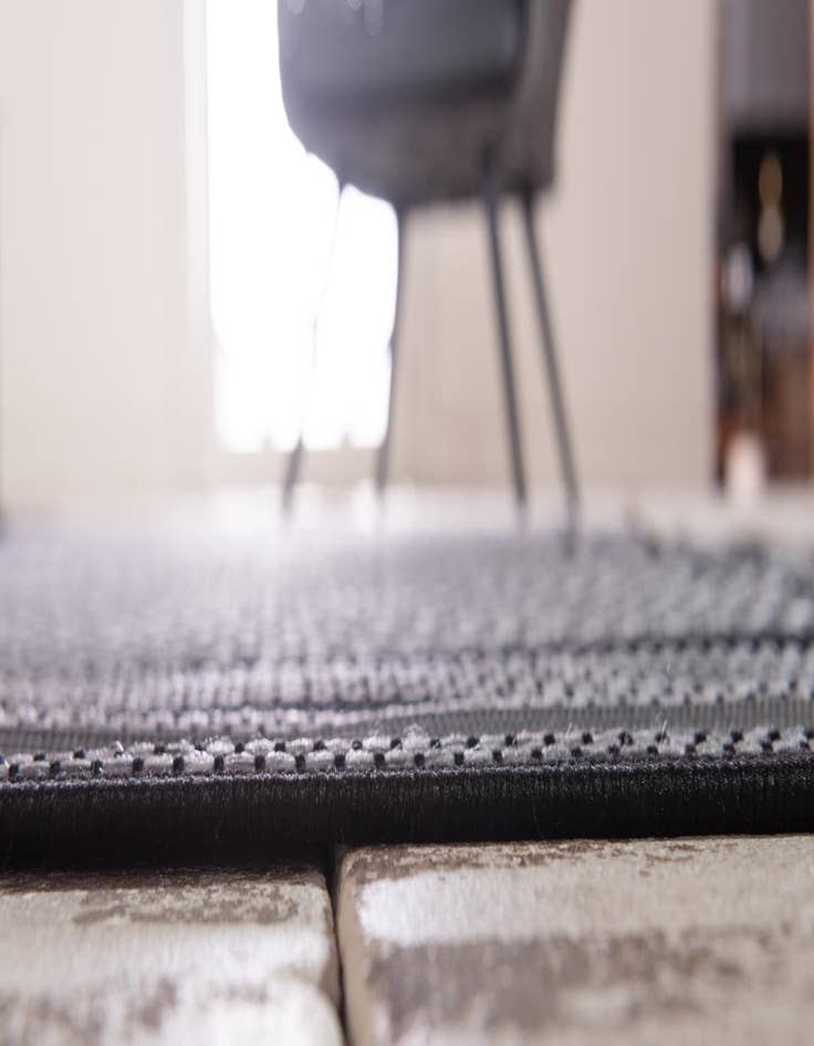 Detail image of  3' 3 x 5'  Washable Border Indoor / Outdoor Rug