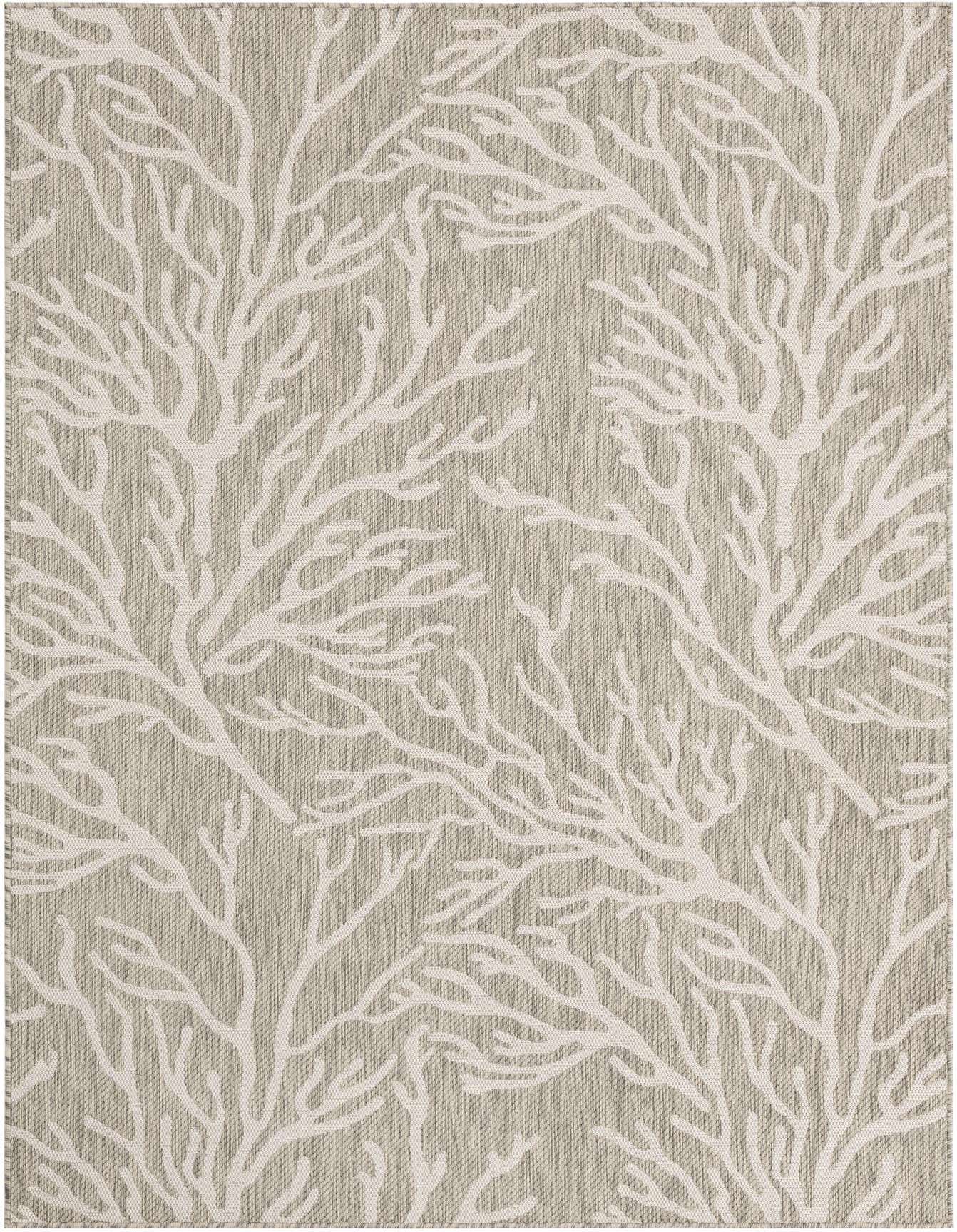 A 6x9 rectangular indoor/outdoor rug featuring a modern coastal coral pattern in light gray and off-white.