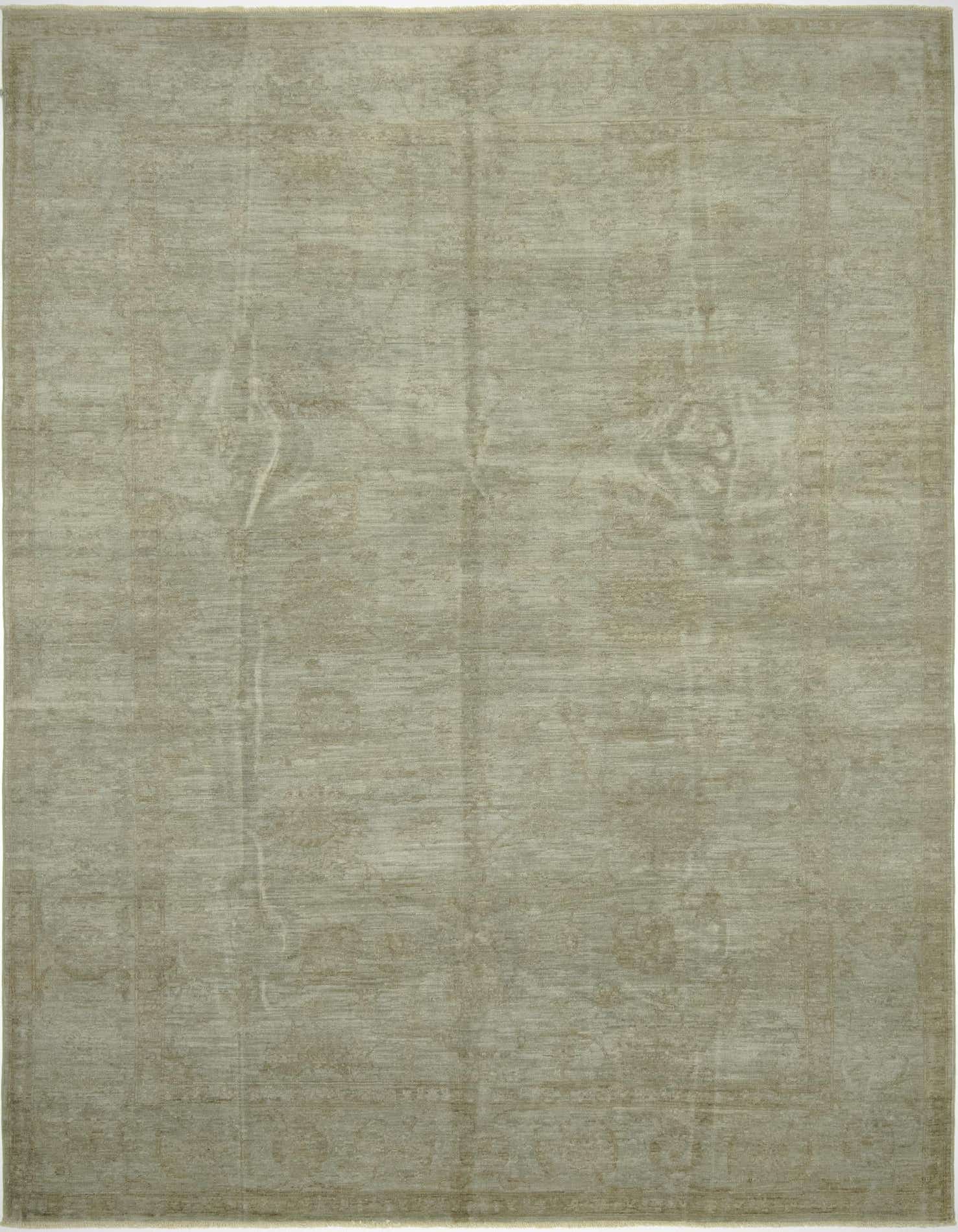 A 6x9 rectangular Over-Dyed Ziegler rug in muted grays and silvers, featuring a subtle vintage Oriental pattern.